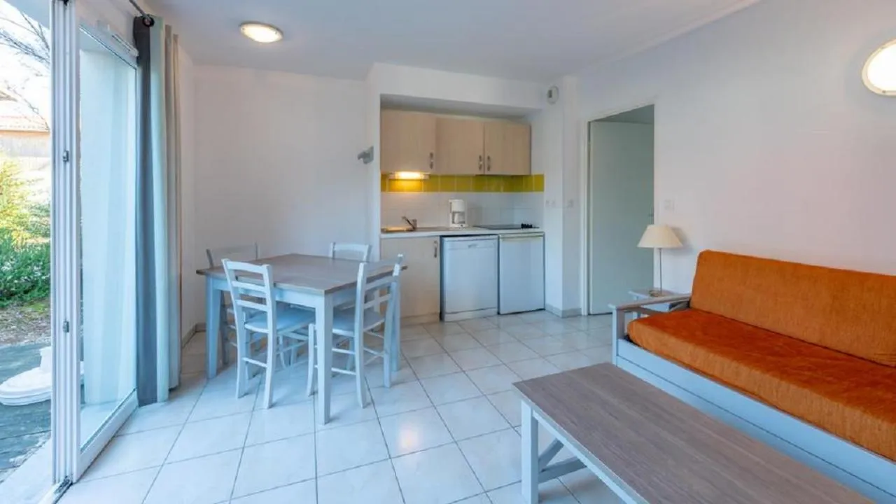 Kitchen or kitchenette in Laouchet Le Hameau des Grands Lacs