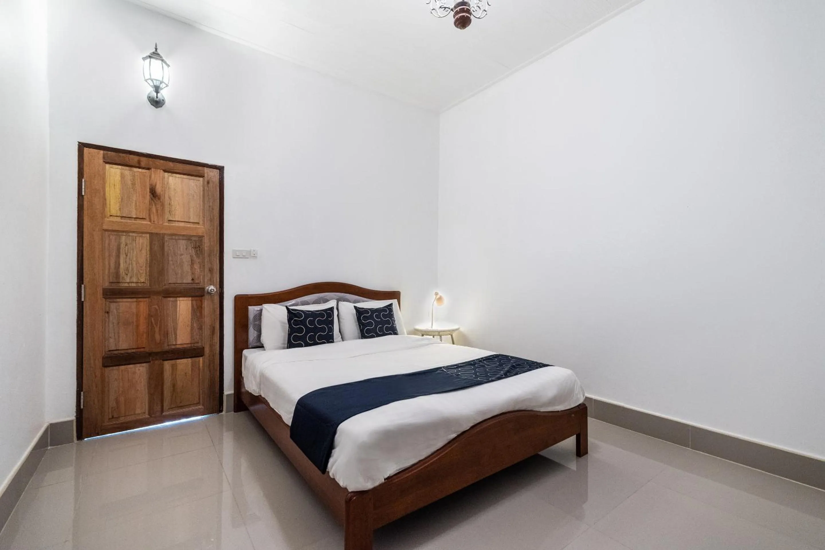 Bedroom in Capital O 805 Suan Palm Farm Nok Resort