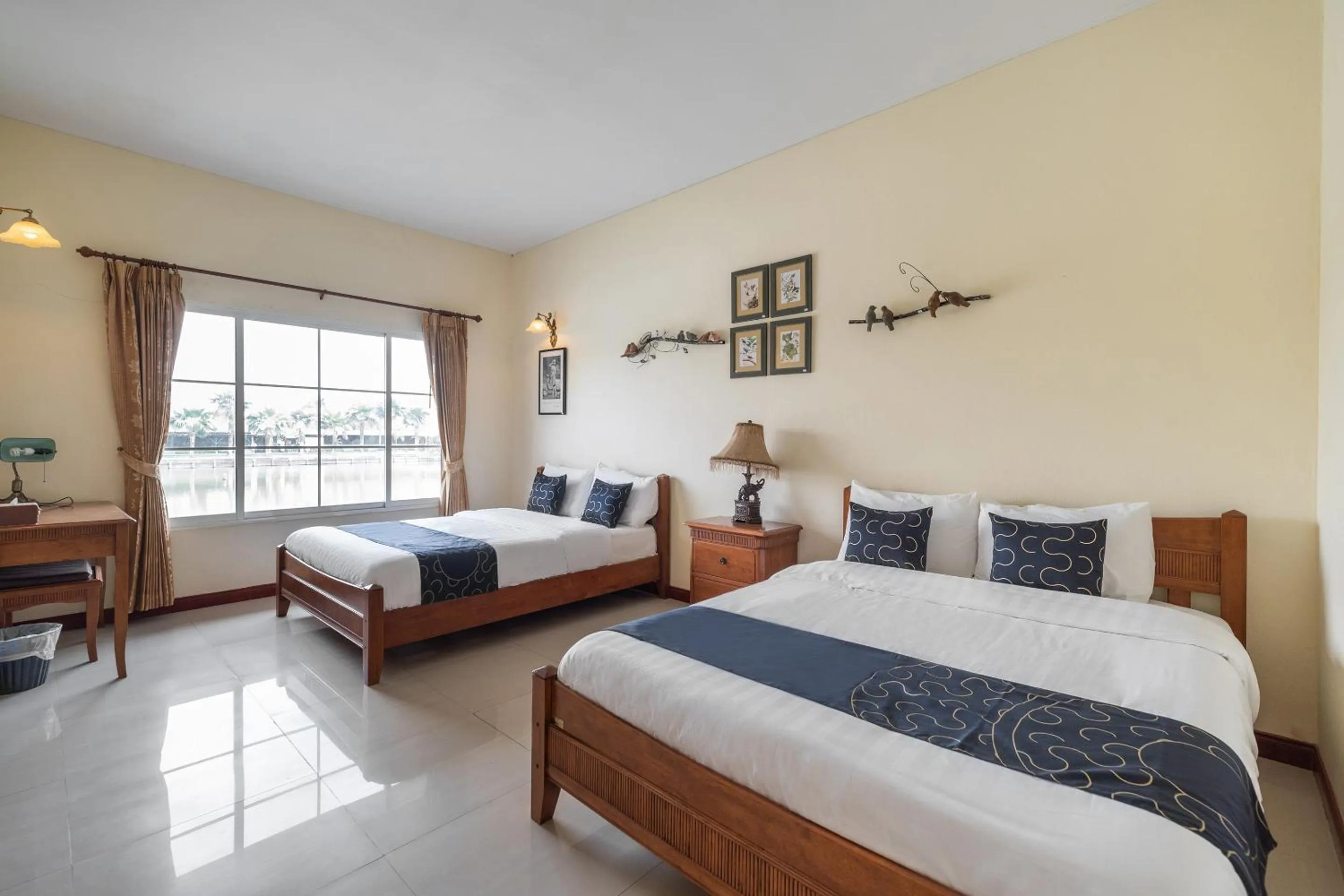 Bedroom in Capital O 805 Suan Palm Farm Nok Resort