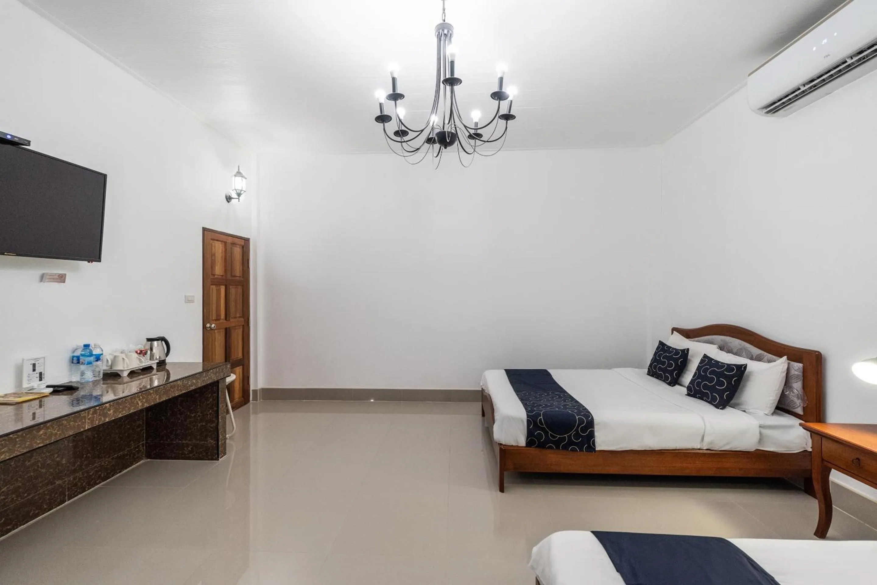 Bedroom in Capital O 805 Suan Palm Farm Nok Resort