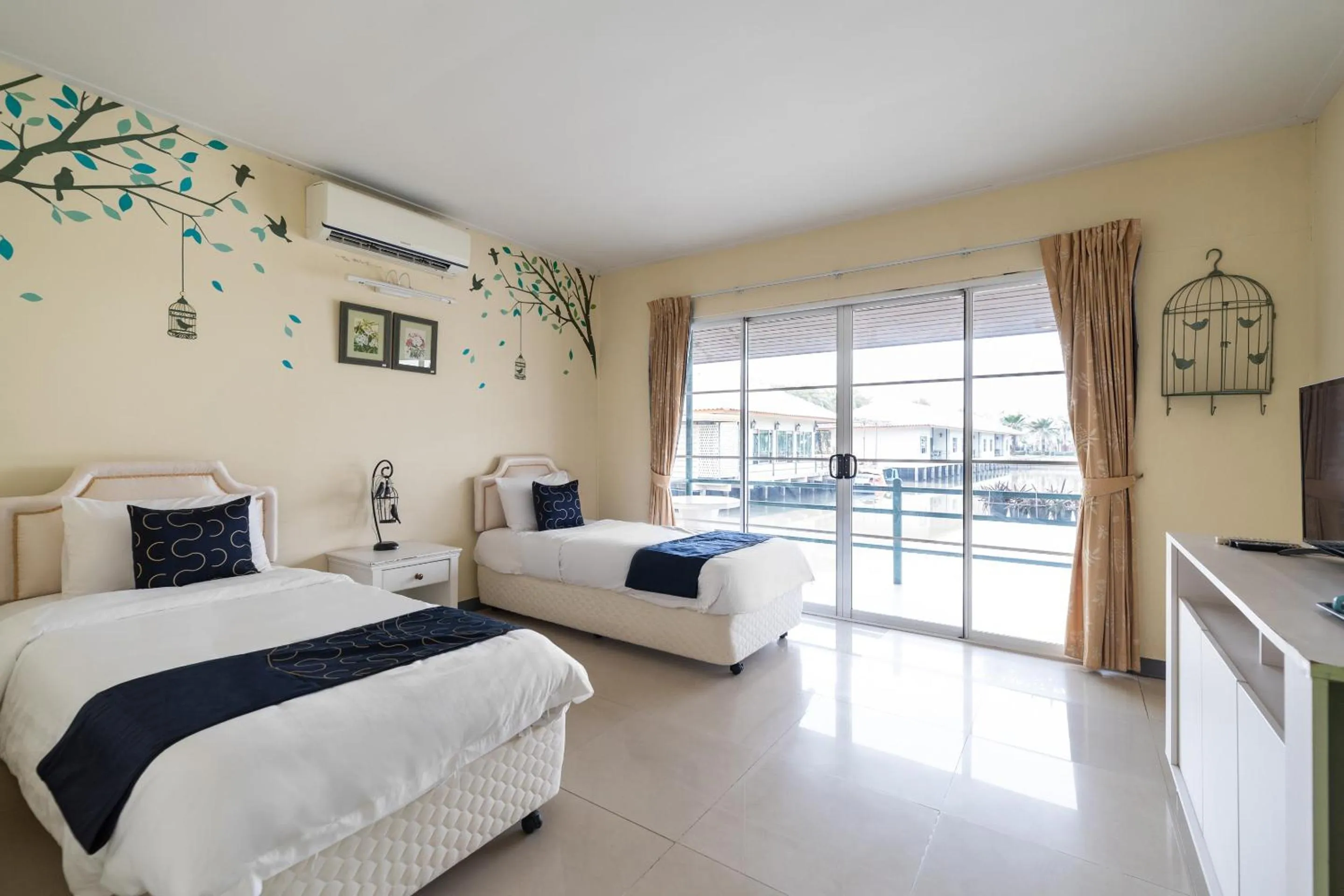 Bedroom in Capital O 805 Suan Palm Farm Nok Resort