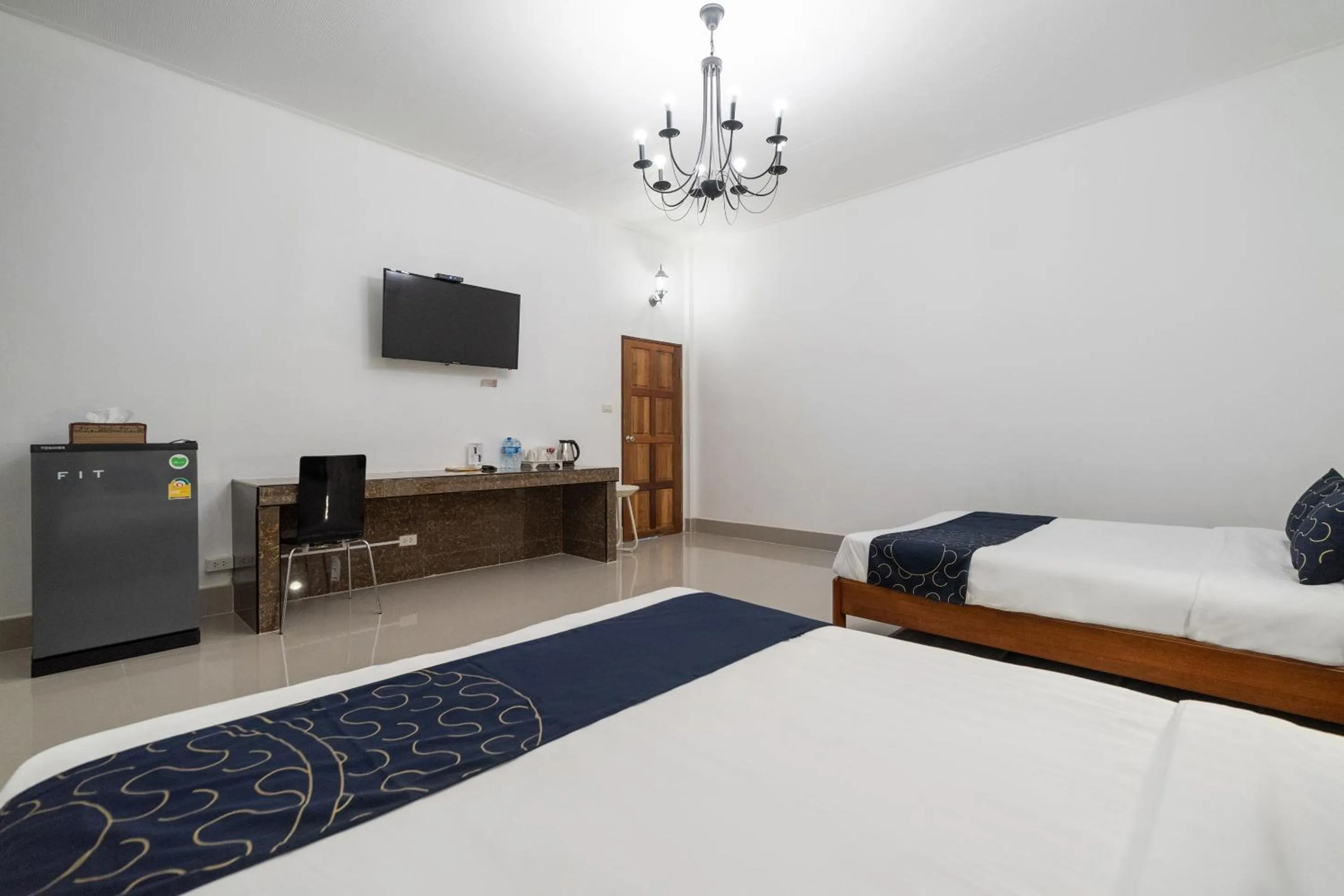 Bedroom, TV/Entertainment Center in Capital O 805 Suan Palm Farm Nok Resort