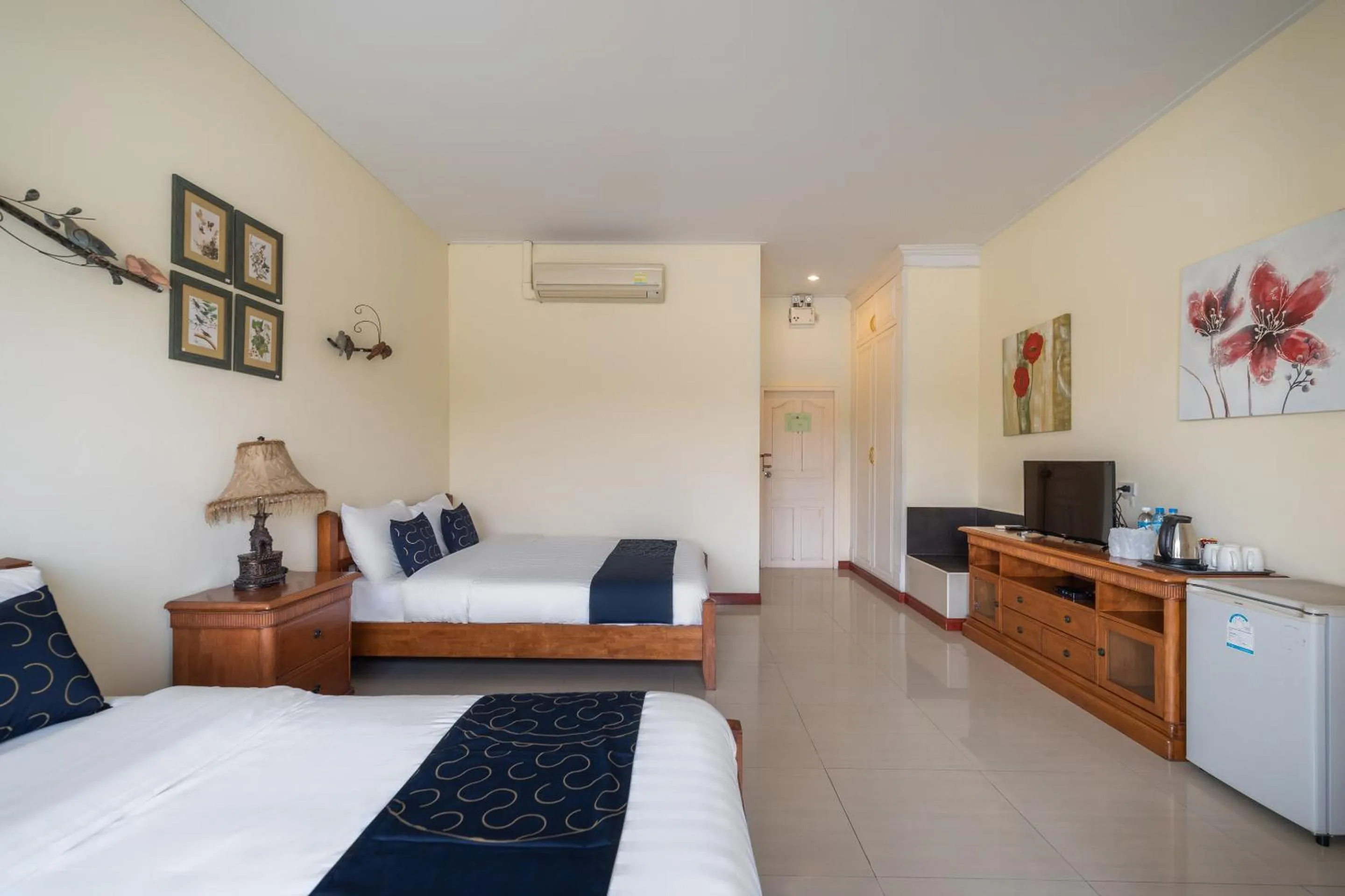 Bedroom in Capital O 805 Suan Palm Farm Nok Resort