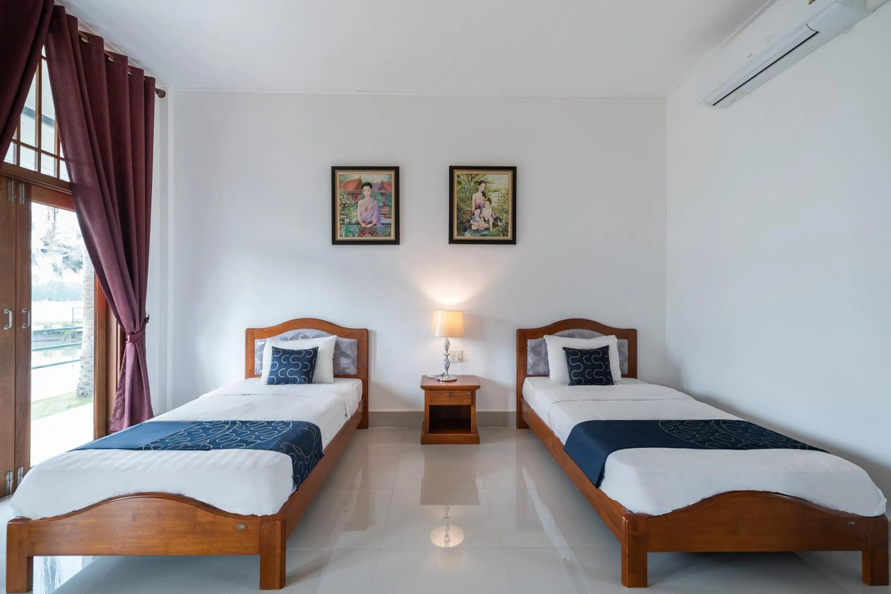 Bedroom in Capital O 805 Suan Palm Farm Nok Resort