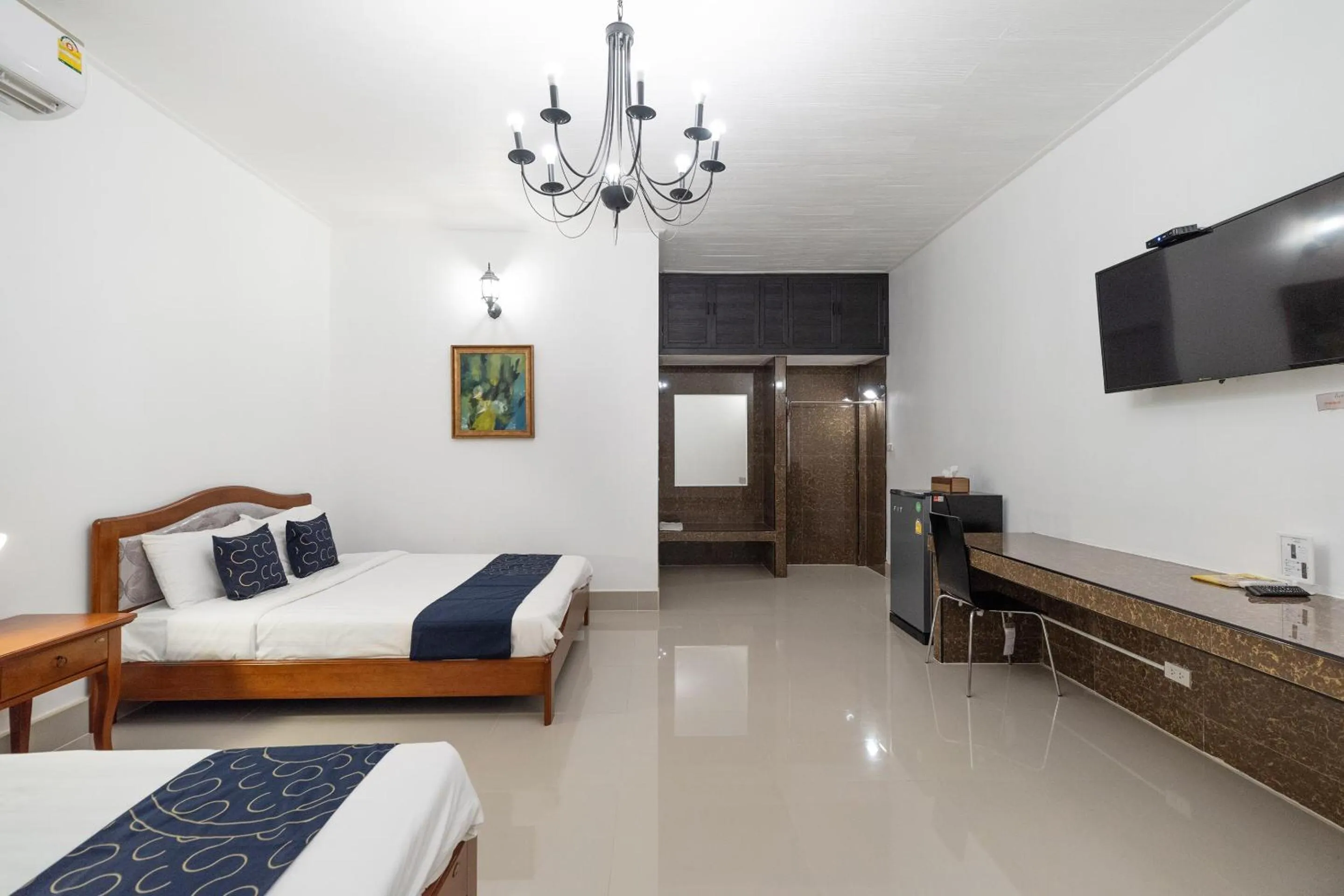 Bedroom, TV/Entertainment Center in Capital O 805 Suan Palm Farm Nok Resort