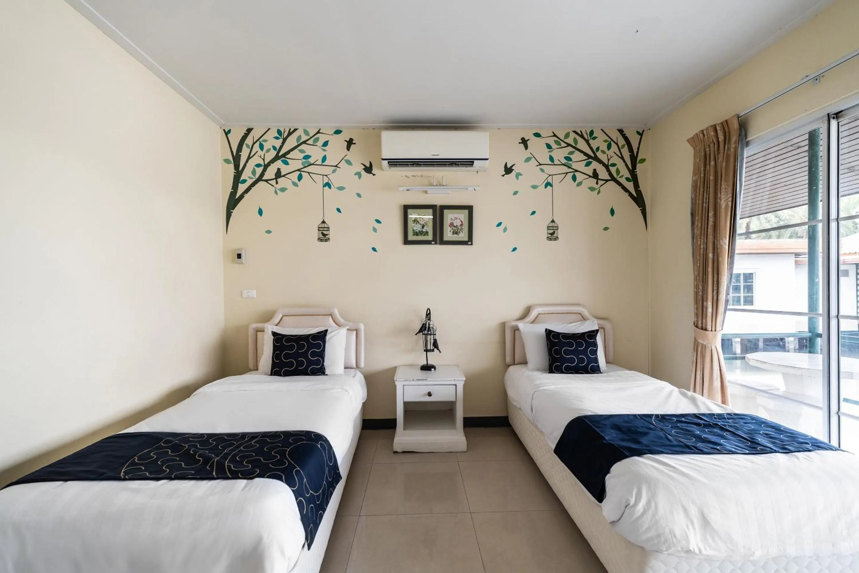 Bedroom in Capital O 805 Suan Palm Farm Nok Resort