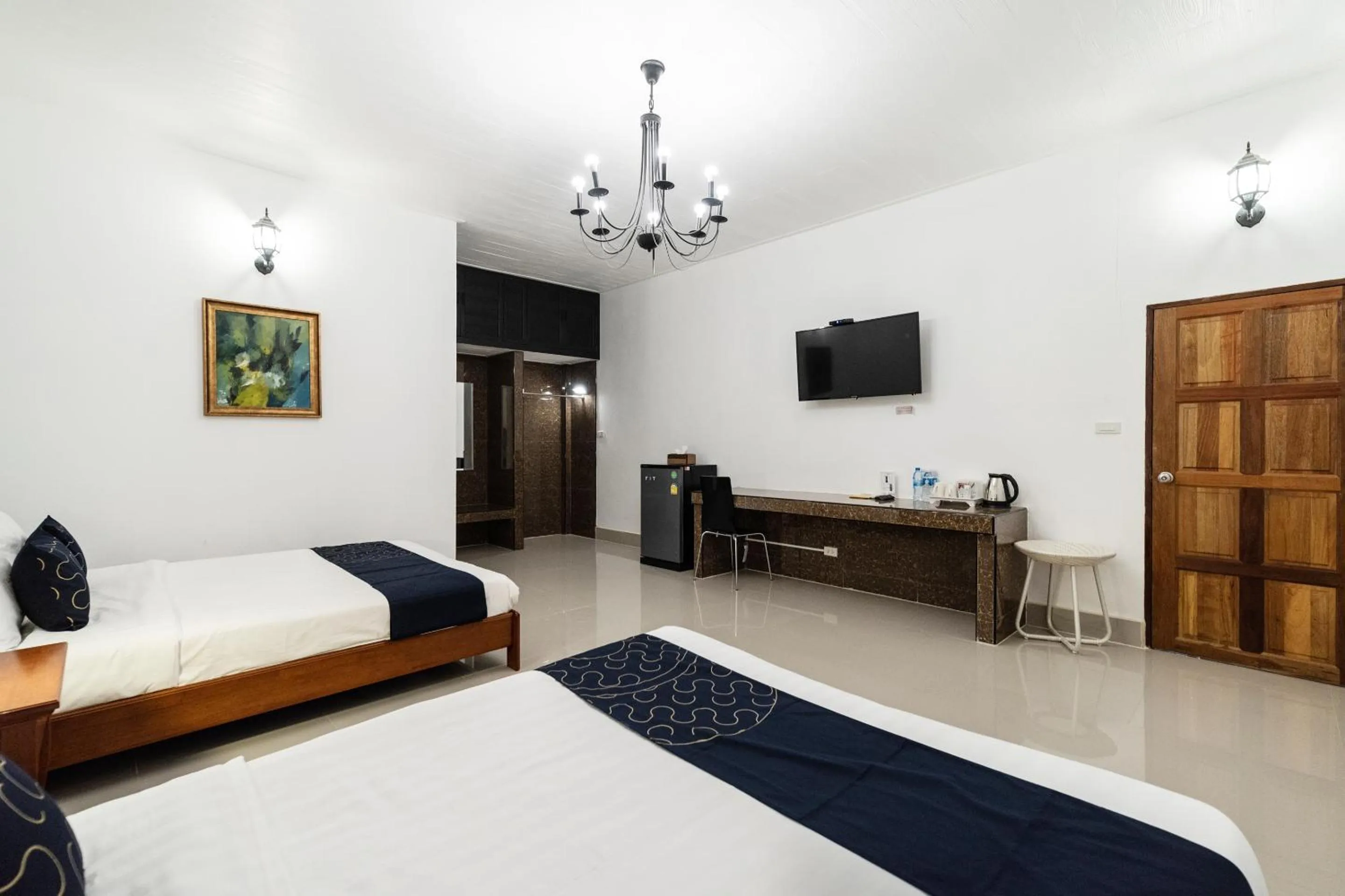 Bedroom, TV/Entertainment Center in Capital O 805 Suan Palm Farm Nok Resort