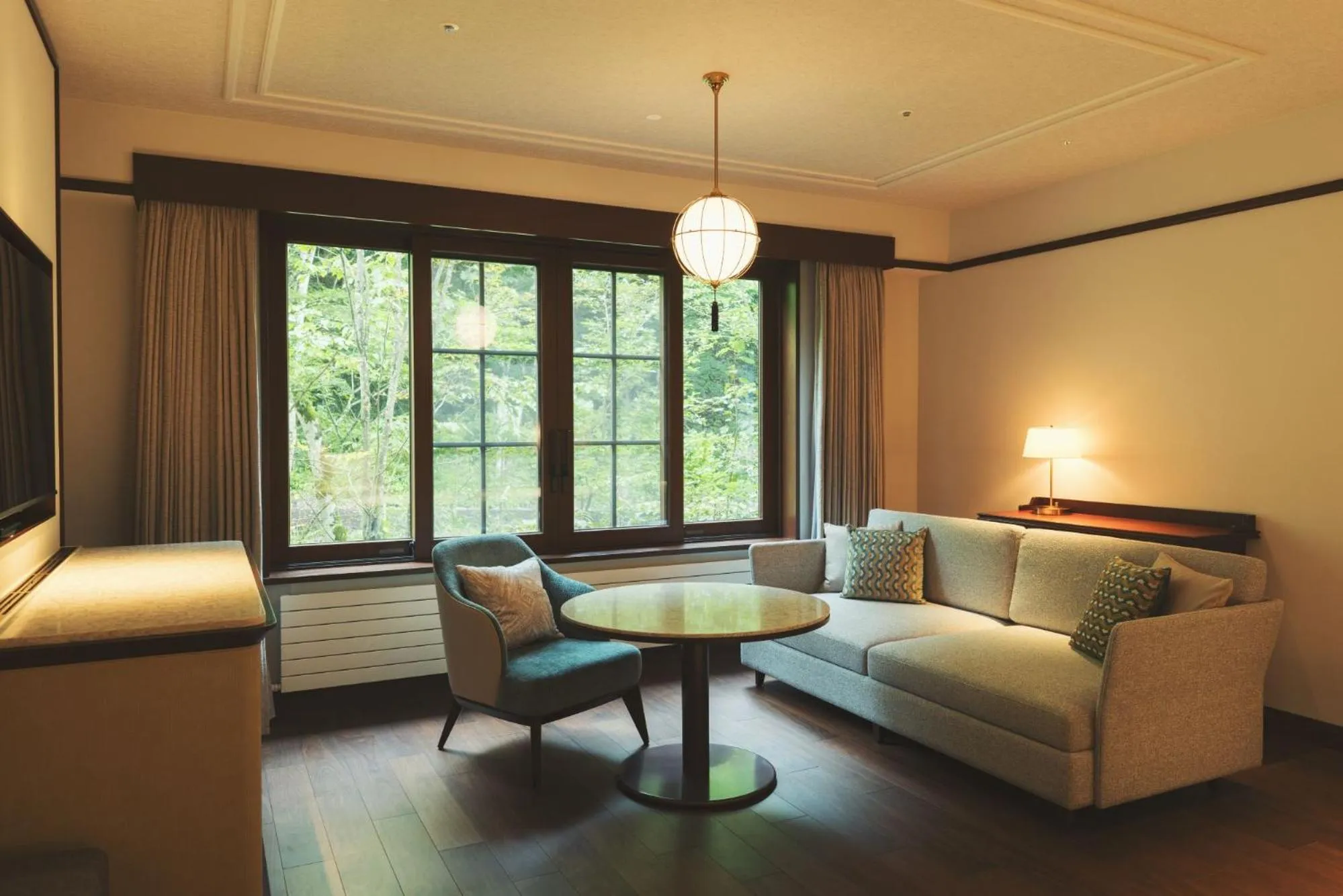 Living room, Bed in Mampei Hotel