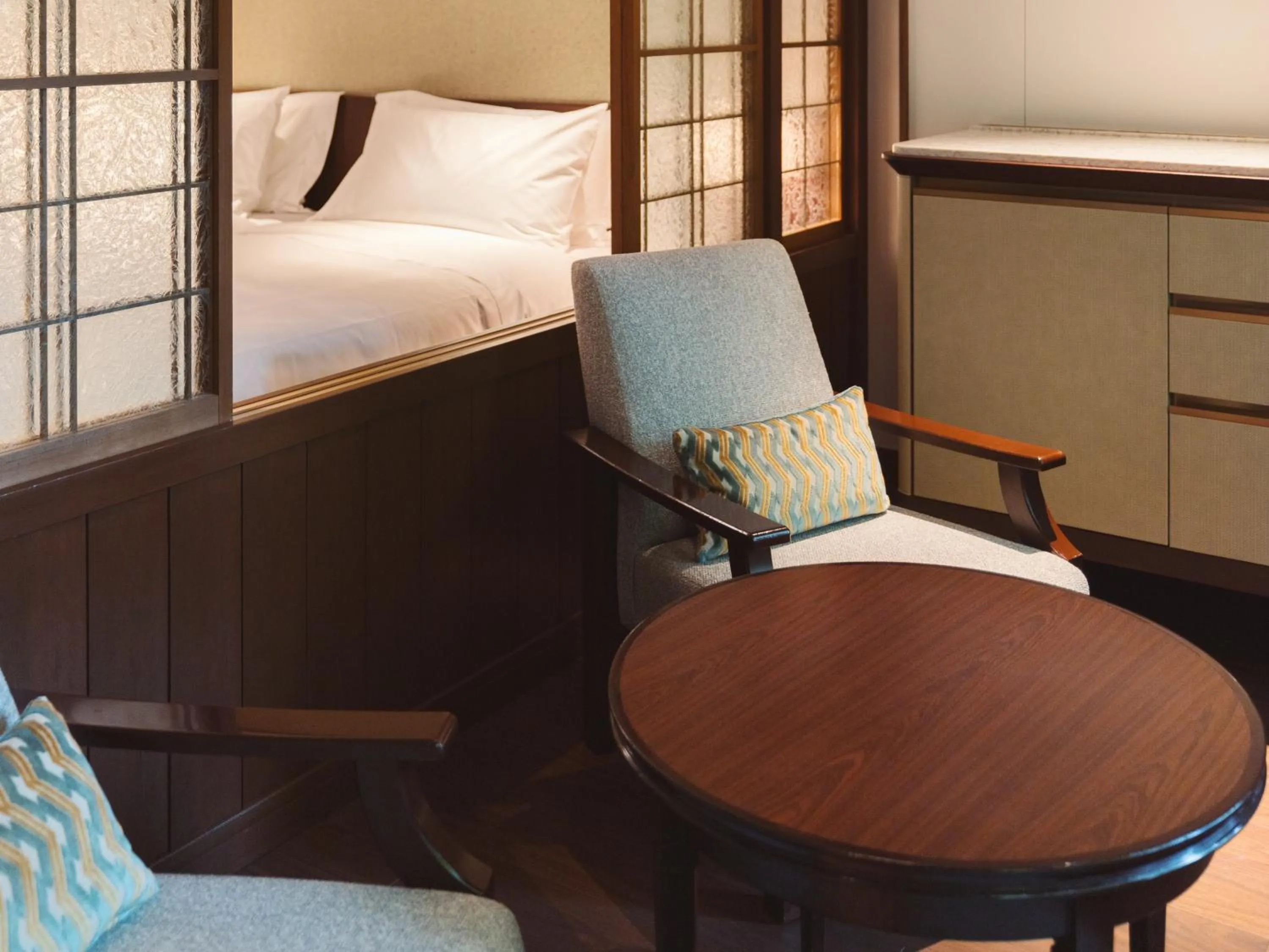 Living room, Bed in Mampei Hotel