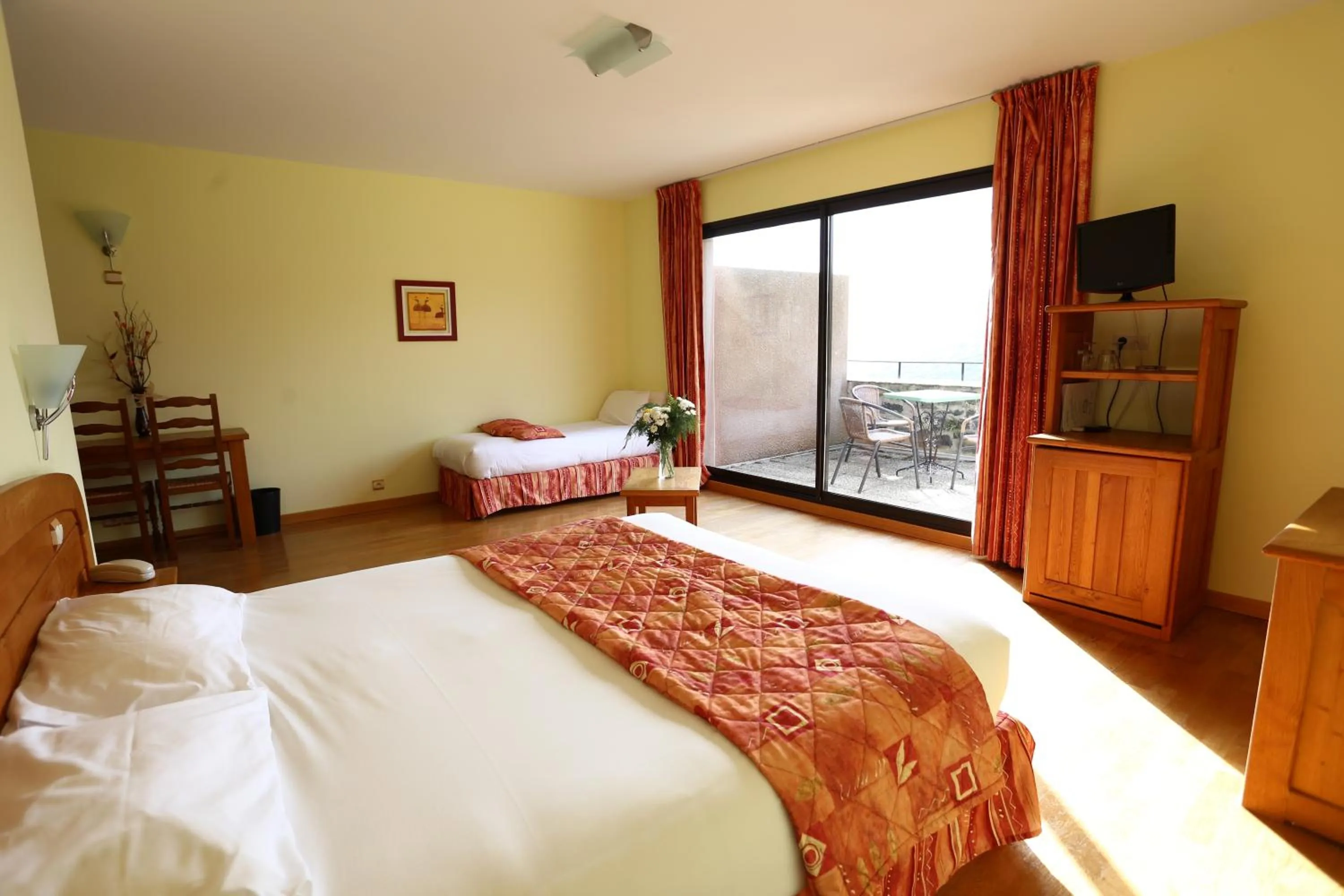 Photo of the whole room in Logis Hôtel-restaurant La Mère Biquette