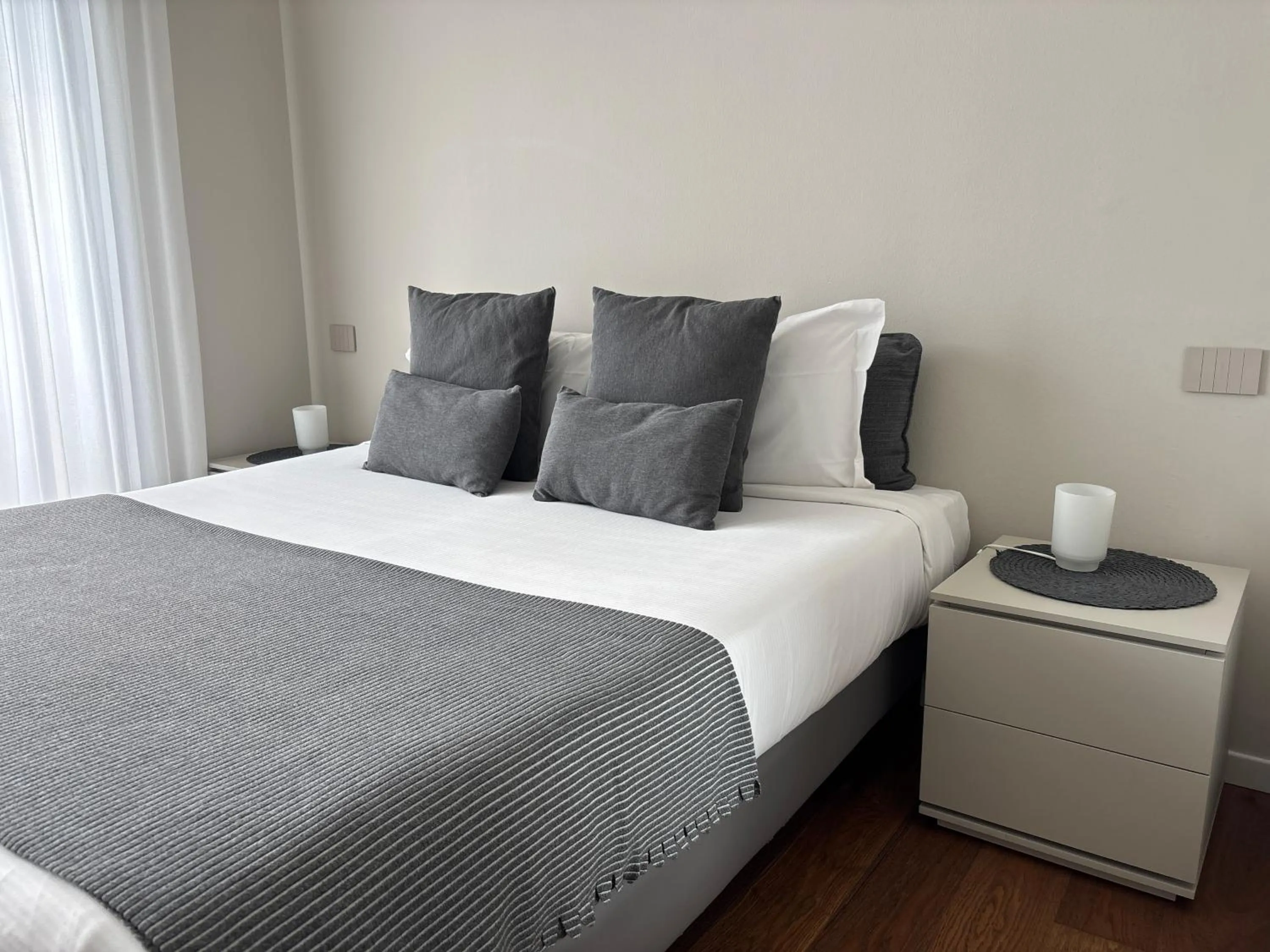 Bed in Aparthotel Isola