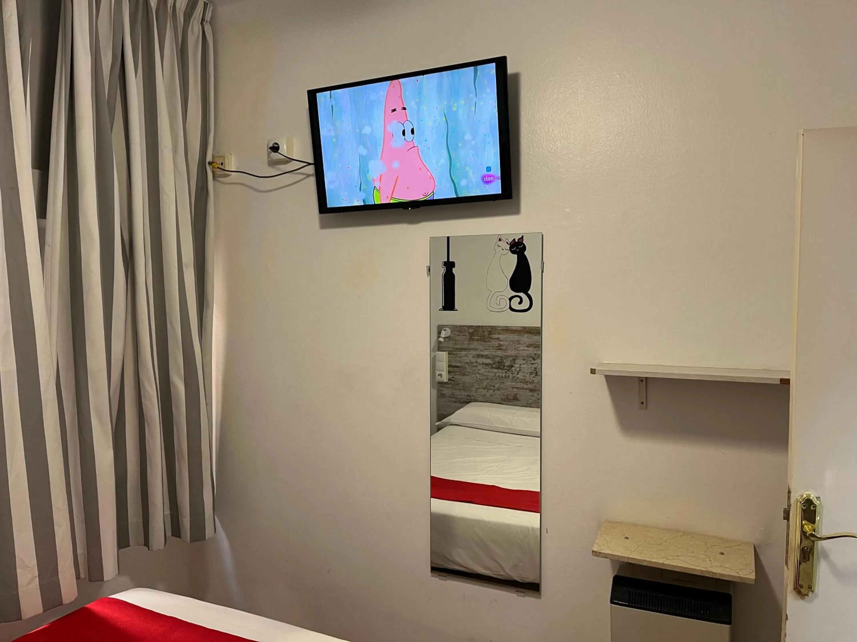 TV and multimedia, Bed in Casa de Huéspedes Almansa