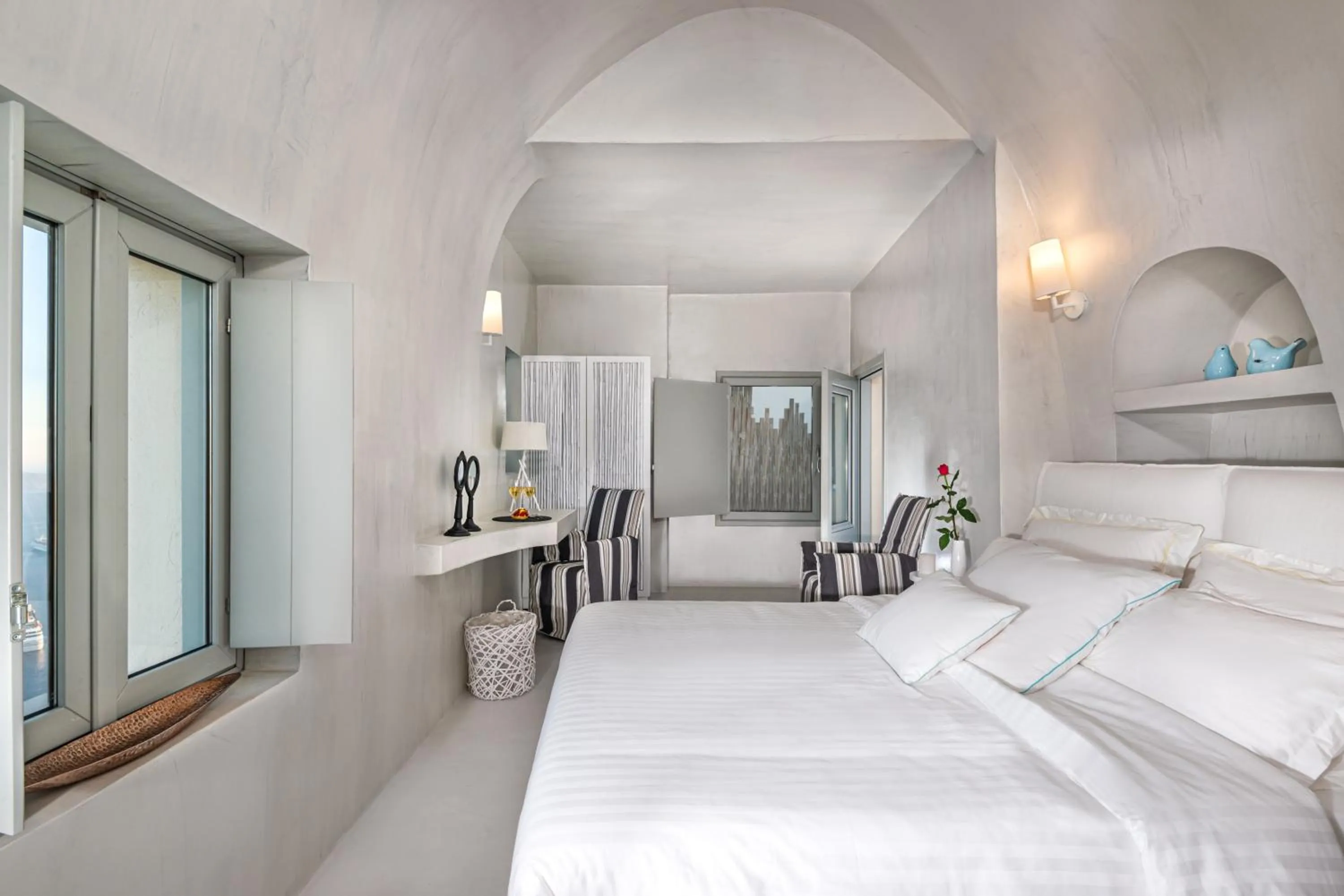 Seating area, Bed in Mythical Blue Luxury Suites