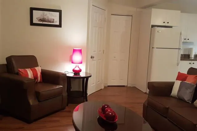 Living room in Two-Bedroom Apartment Sweet #4 by Amazing Property Rentals