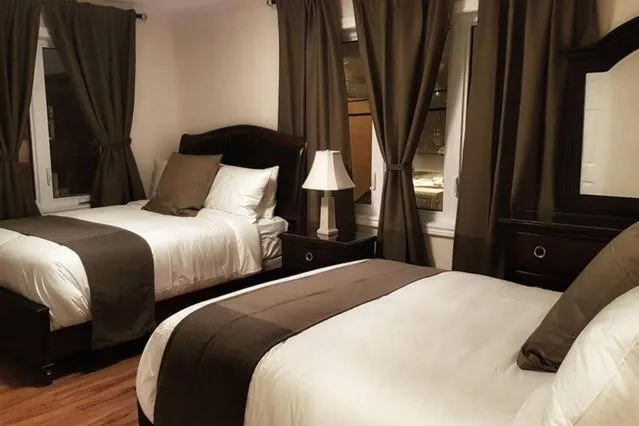 Bed in Two-Bedroom Apartment Sweet #4 by Amazing Property Rentals