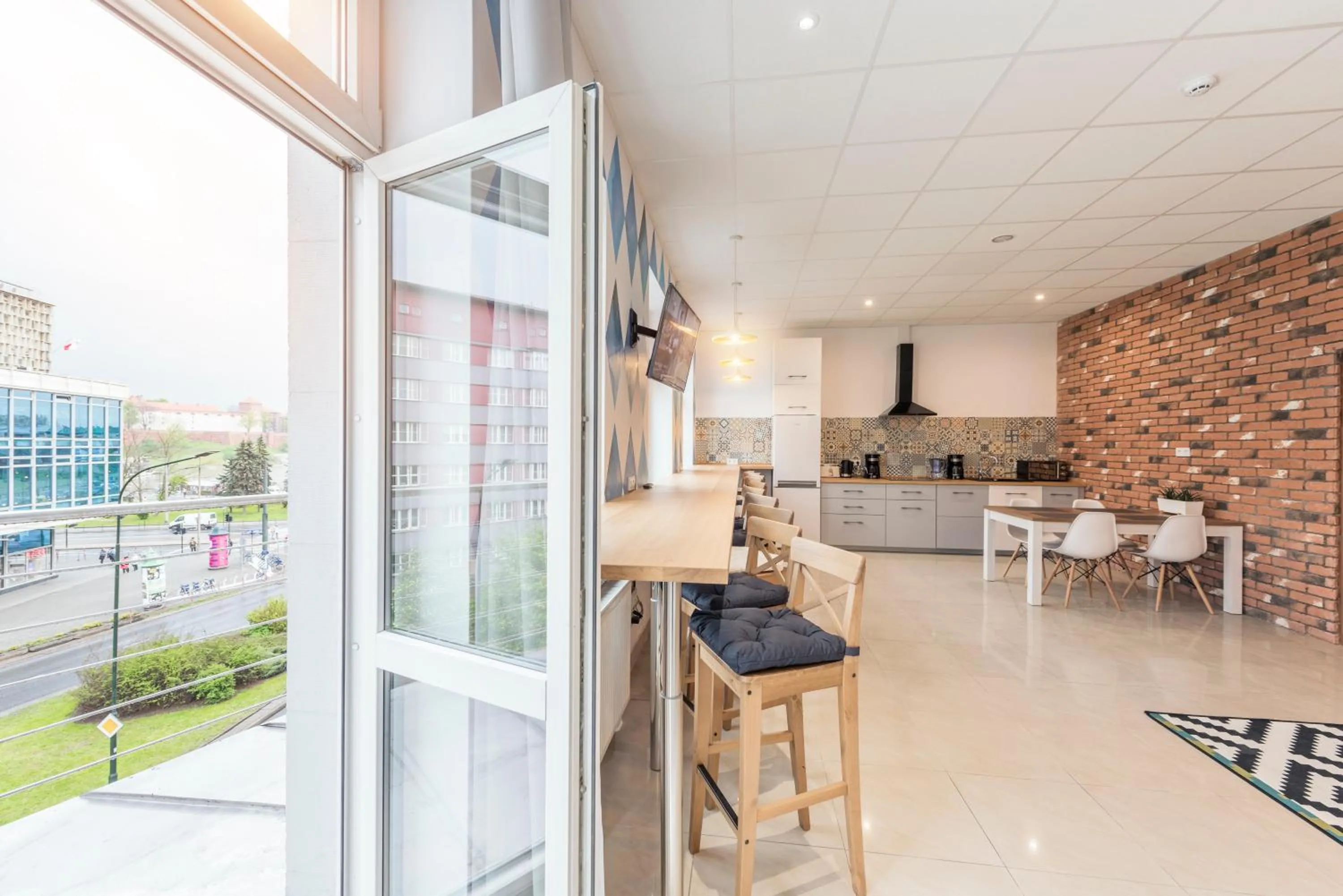 Communal lounge/ TV room in Ginger ApartHostel