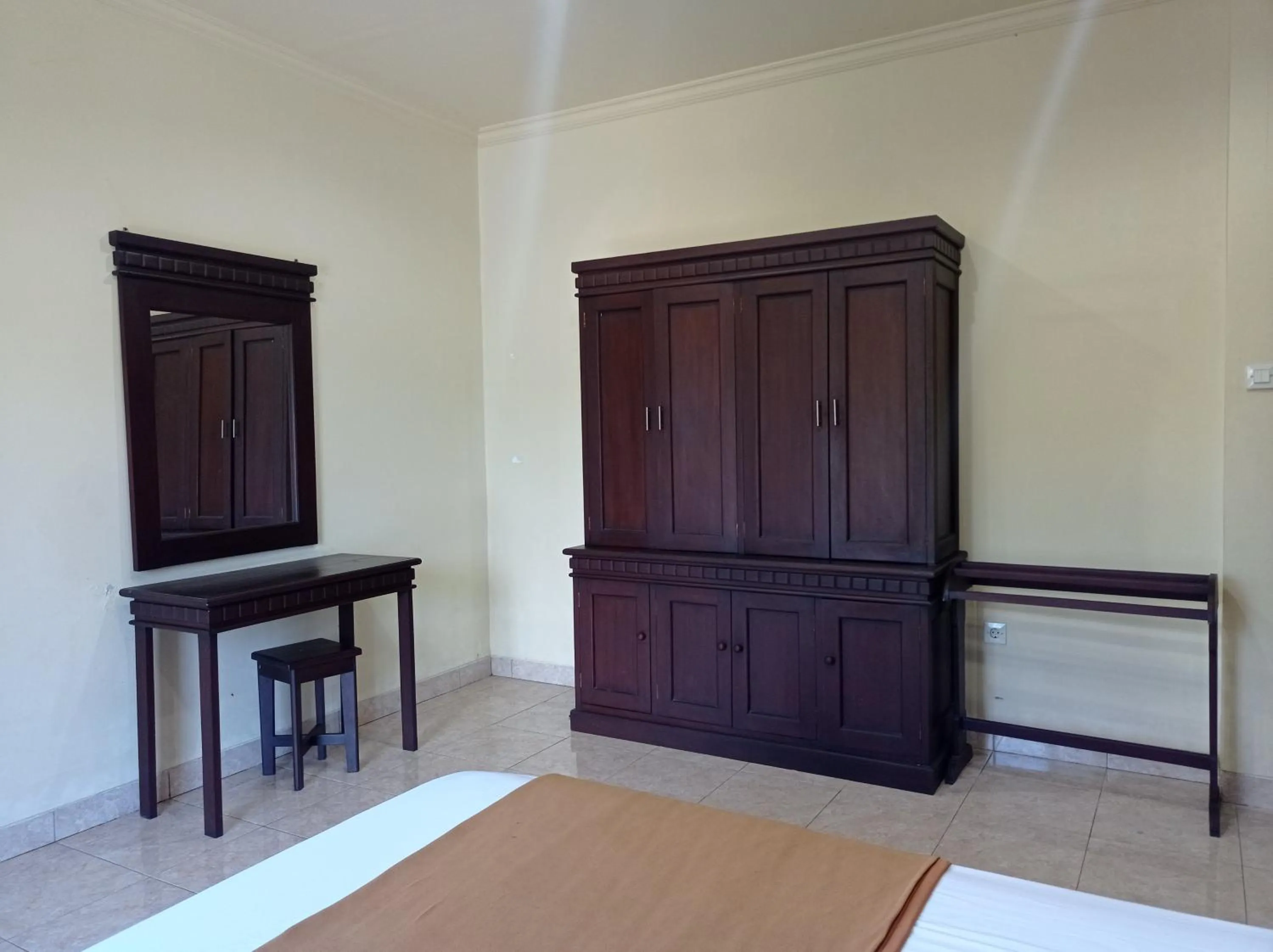 Bed in Hotel Mawar Sari Mitra RedDoorz