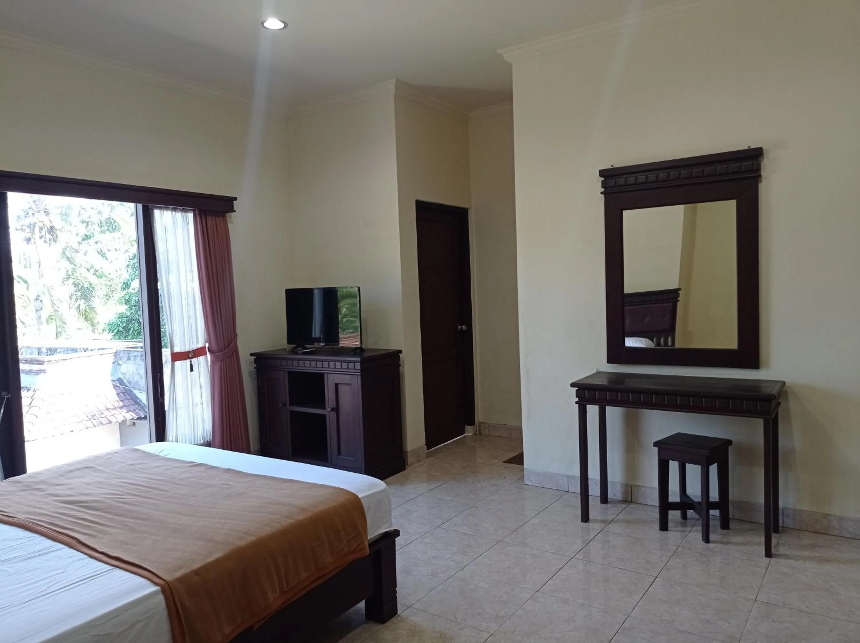 Bed in Hotel Mawar Sari Mitra RedDoorz