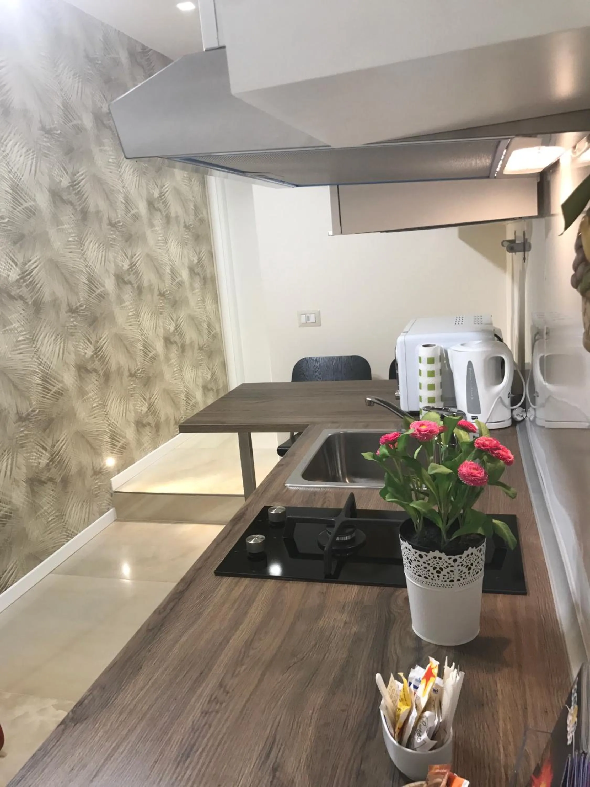 Communal lounge/ TV room in Aquila house