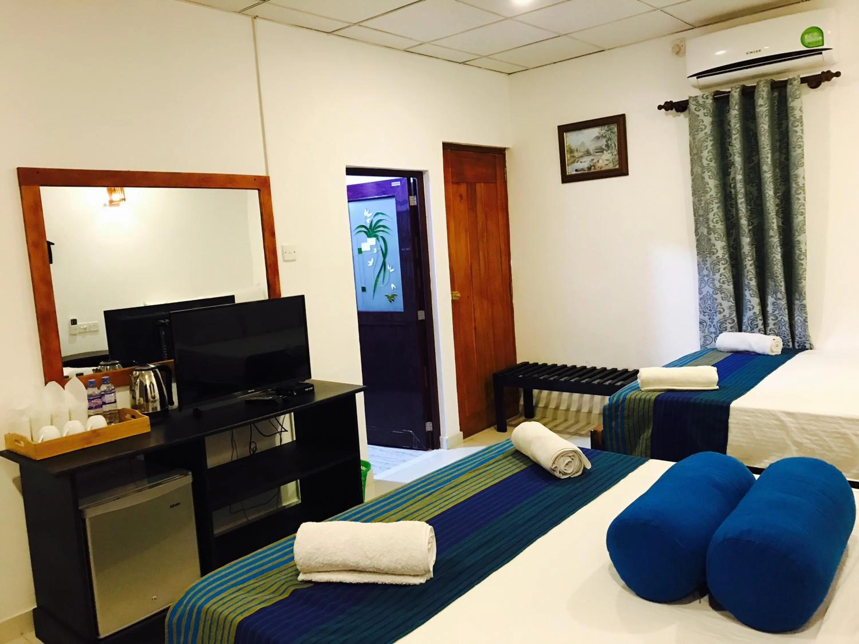 Bed in Sunshine Resort & Spa Sigiriya