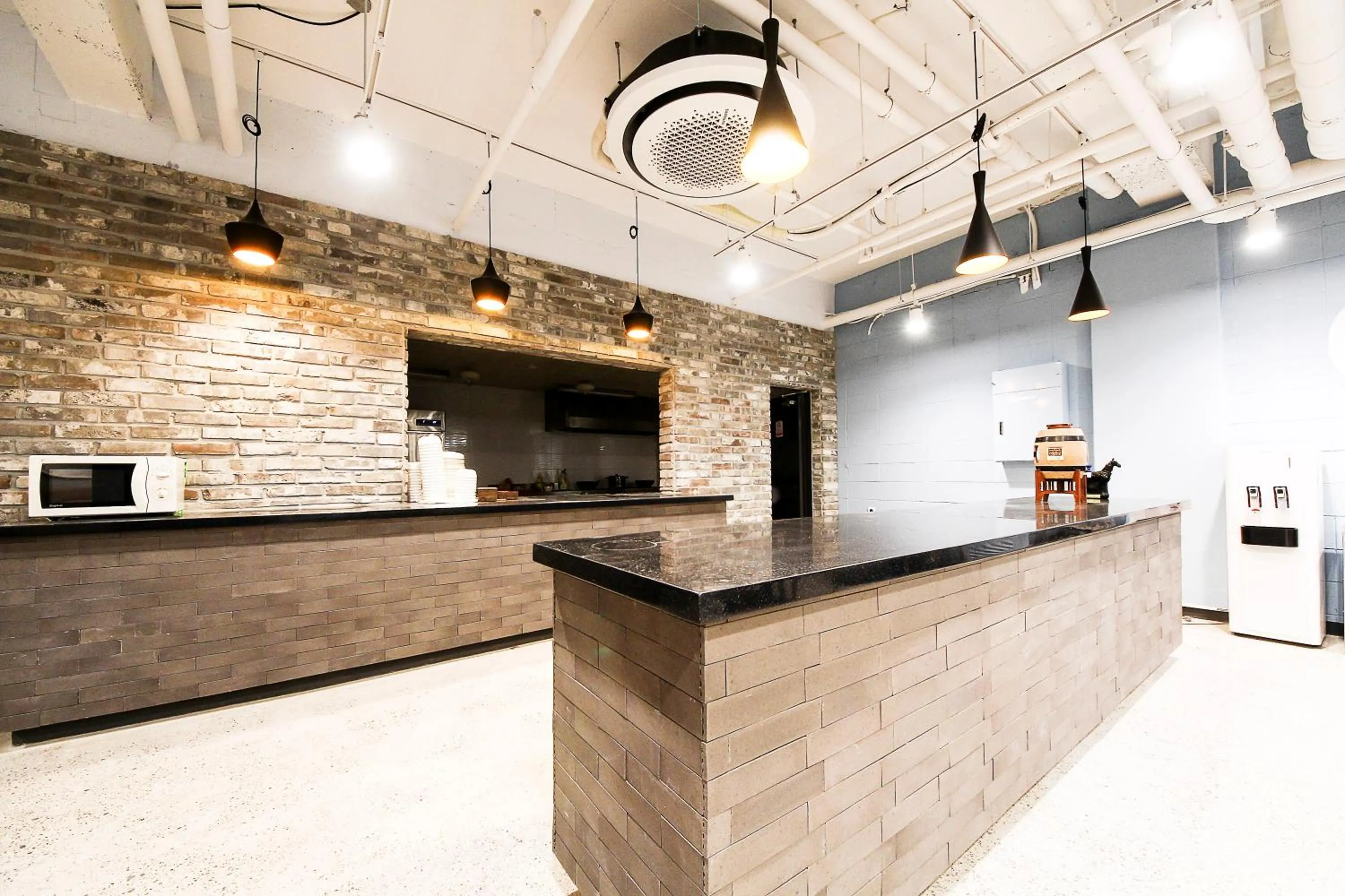 Kitchen or kitchenette, Lobby/Reception in Jeju Jungmun Ocean Blue Hotel