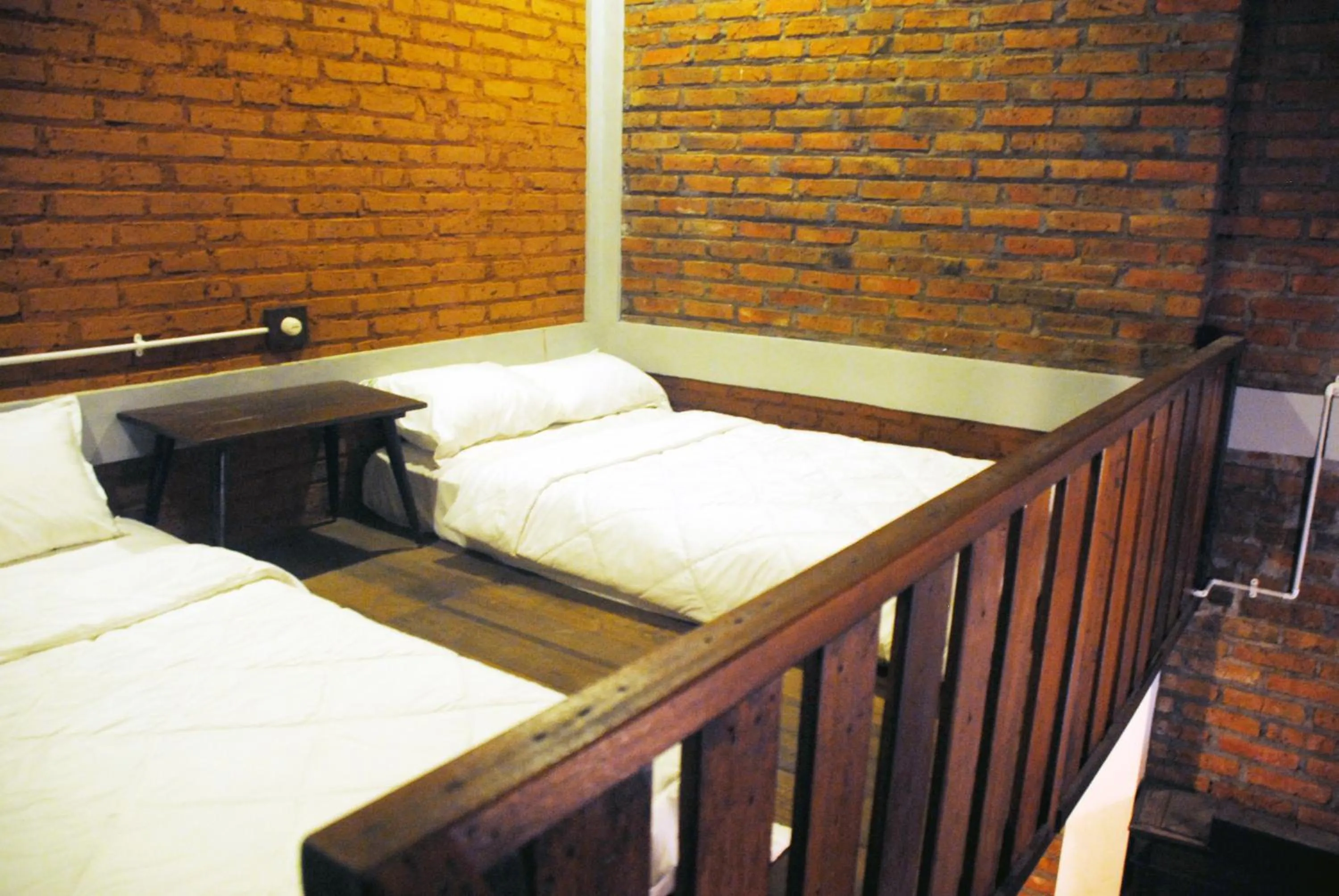 Bed in Griya Gribig Guest House Mitra RedDoorz