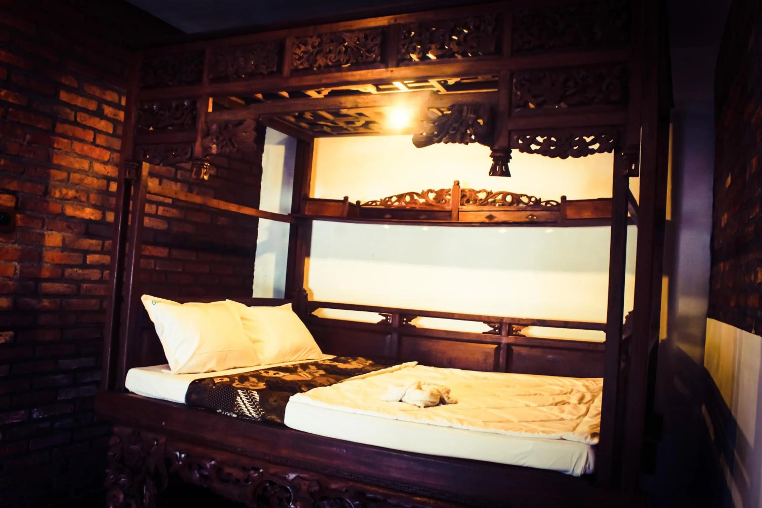 bunk bed in Griya Gribig Guest House Mitra RedDoorz