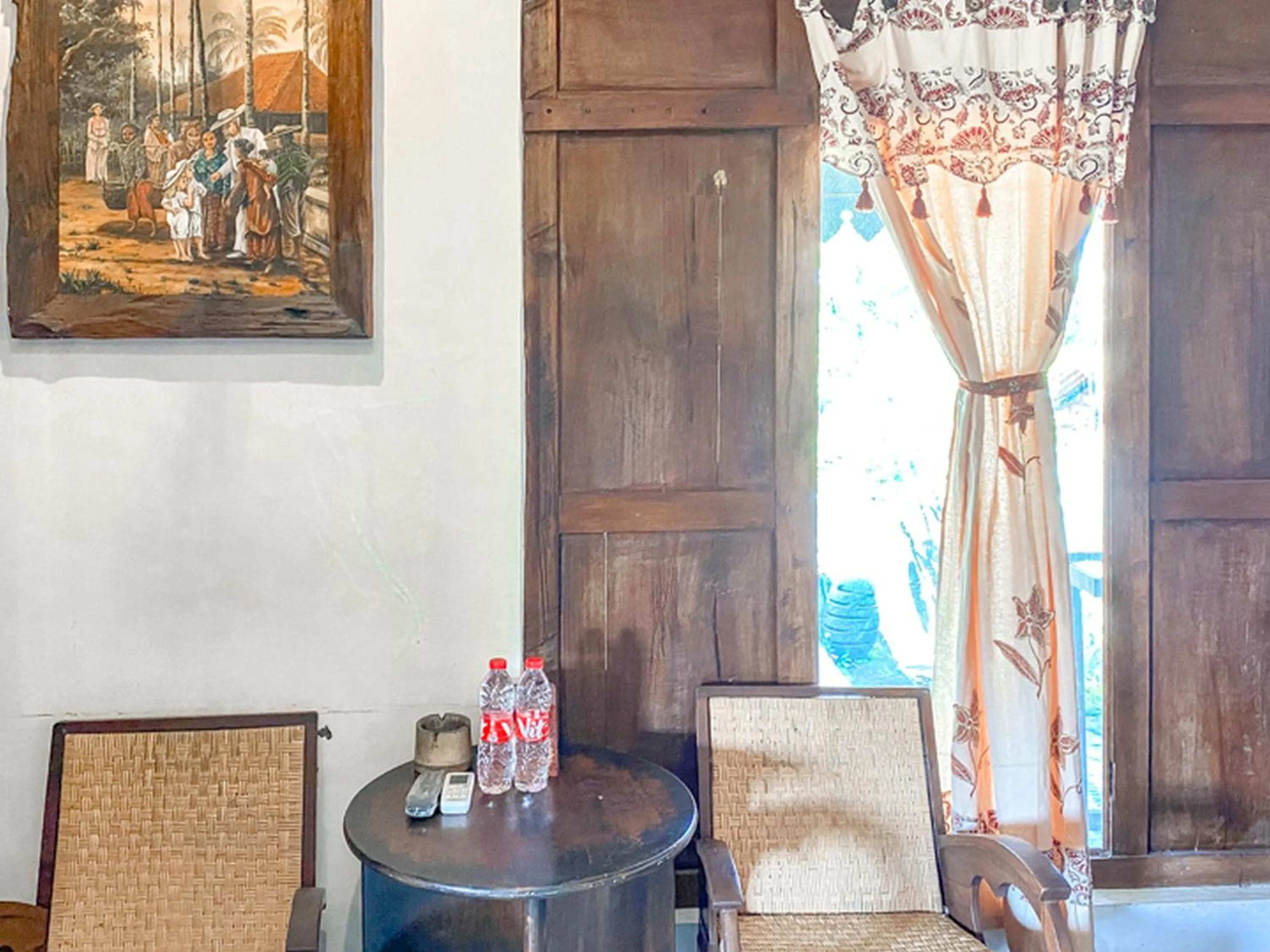 Seating area in Griya Gribig Guest House Mitra RedDoorz