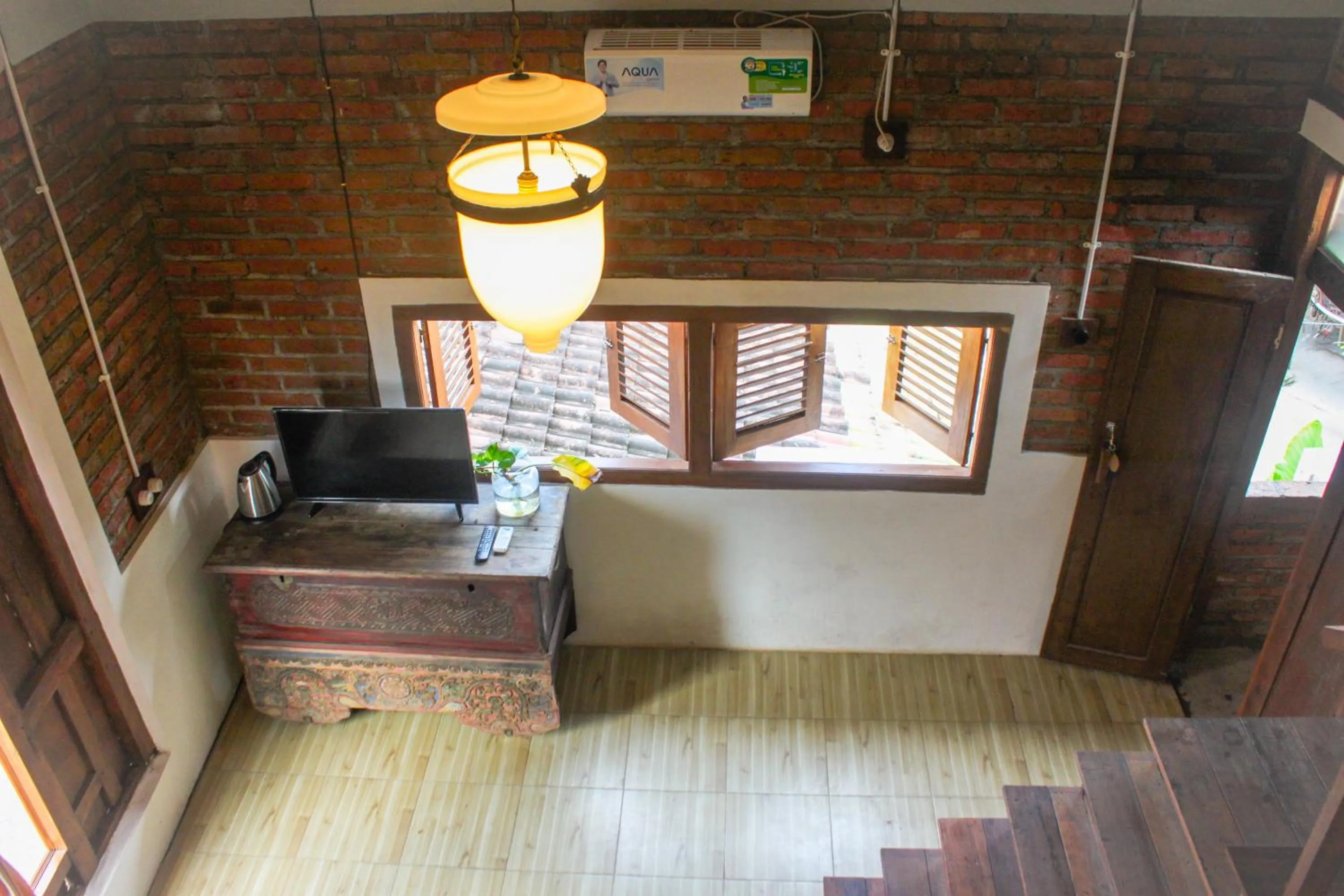 Living room in Griya Gribig Guest House Mitra RedDoorz