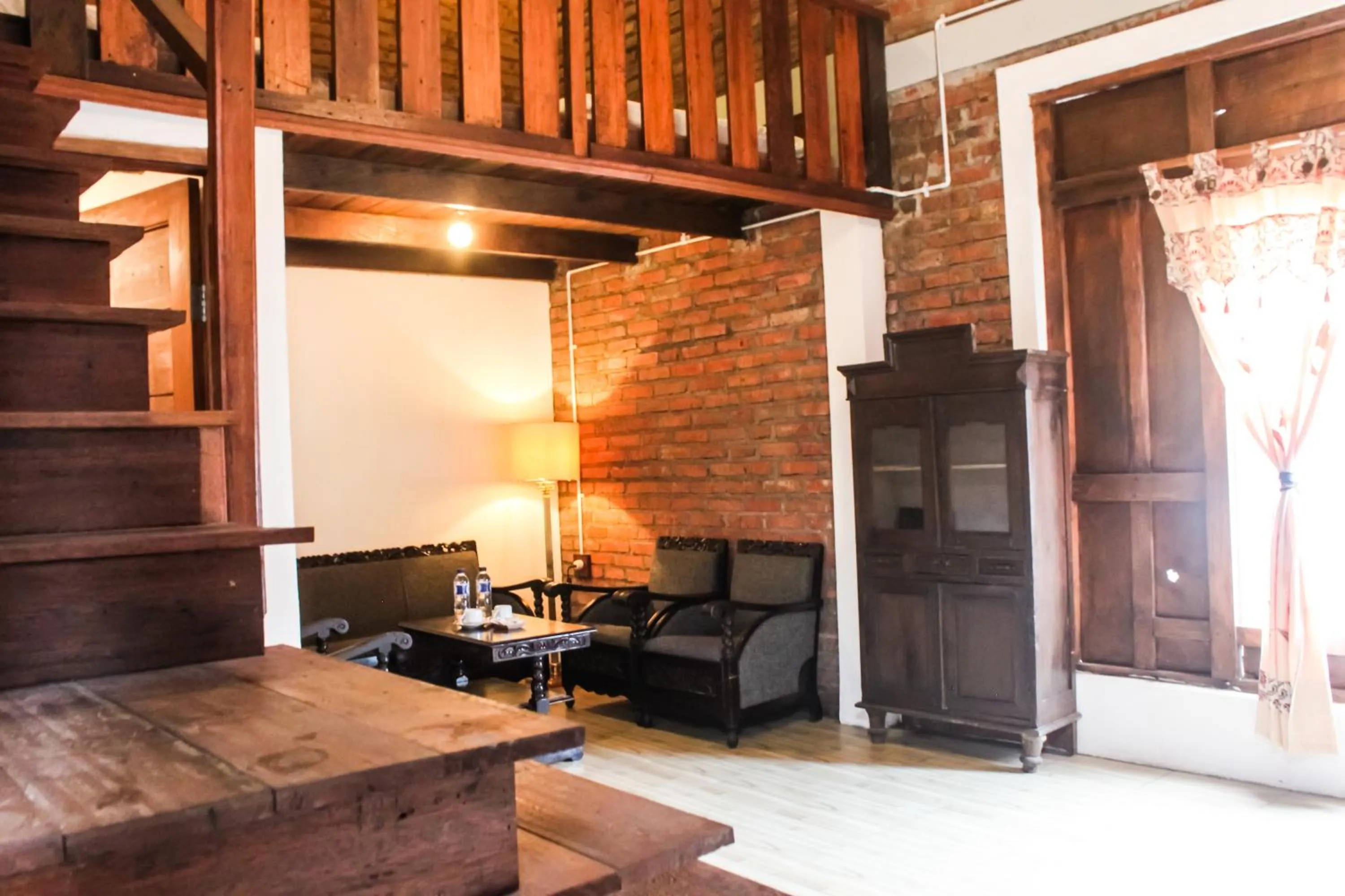 Living room in Griya Gribig Guest House Mitra RedDoorz