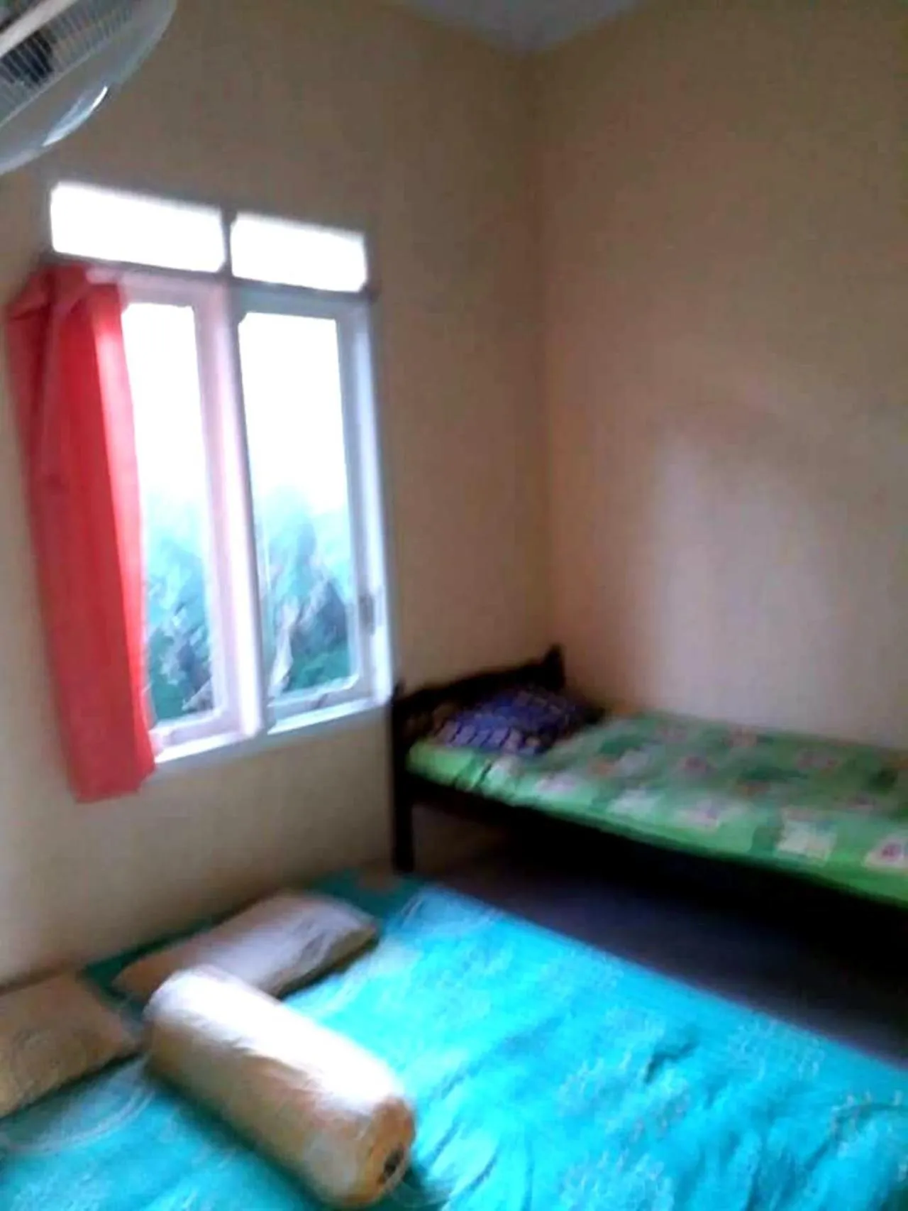 Bed in Kenangan Guest House