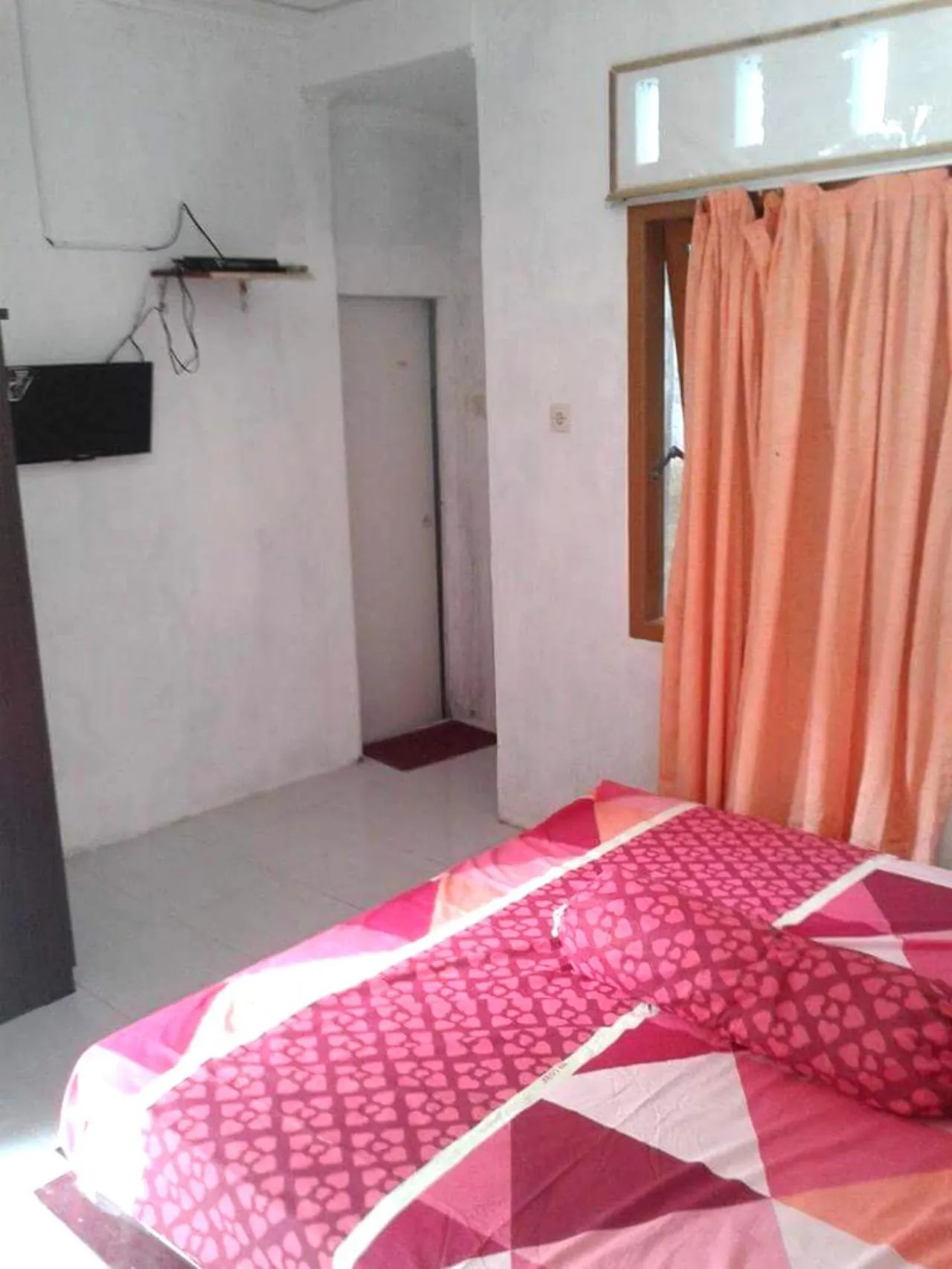 Bed in Kenangan Guest House