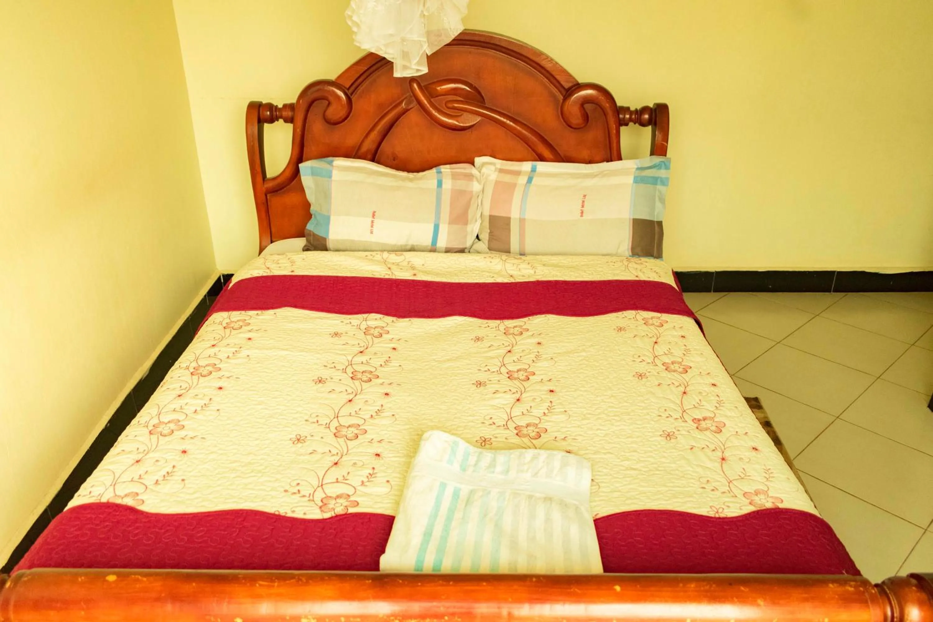 Bed in Relief Motel Fort Portal