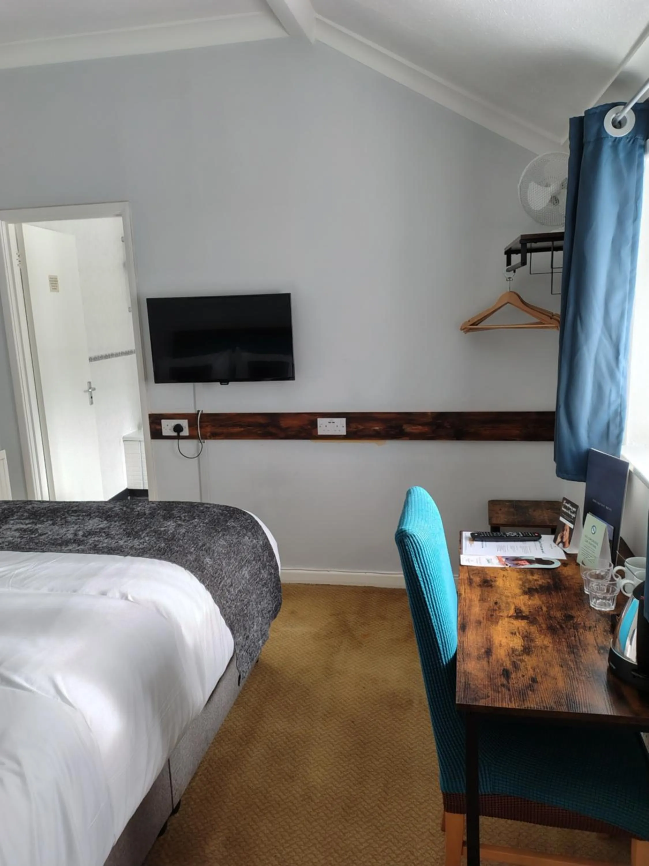 Bed in Rising Sun Hotel by Greene King Inns