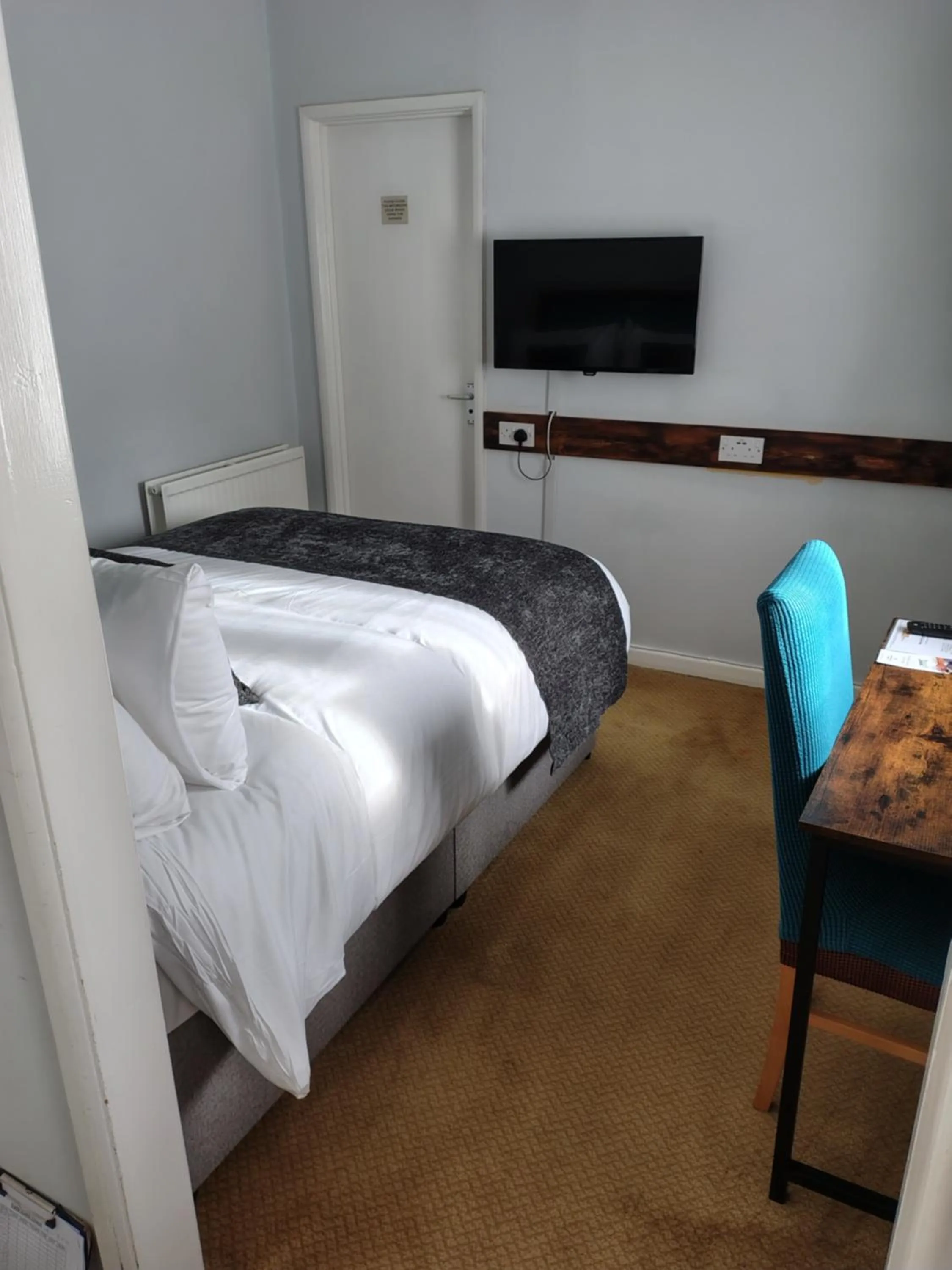 Bed in Rising Sun Hotel by Greene King Inns