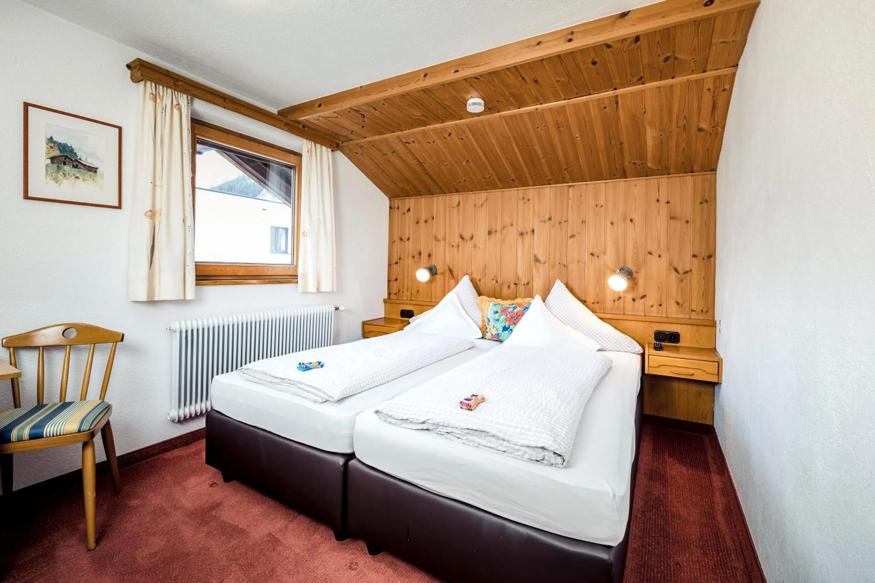 Bed in Pension der Steinbock - das 300 Jahre alte Bauernhaus - TIROL