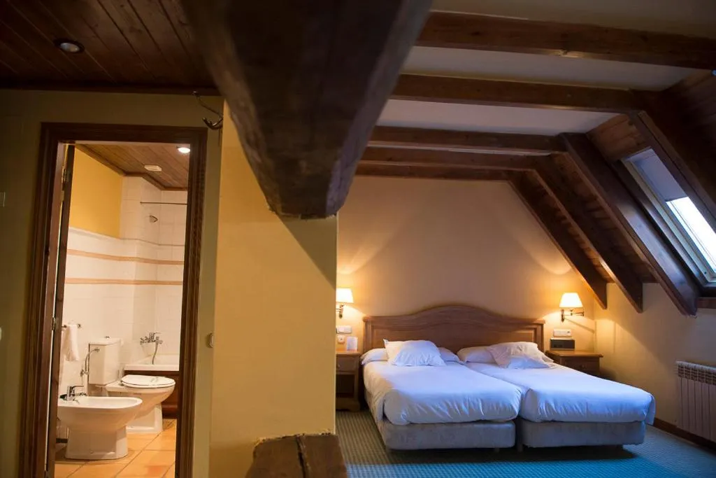 Bed in Hotel Chalet Bassibe