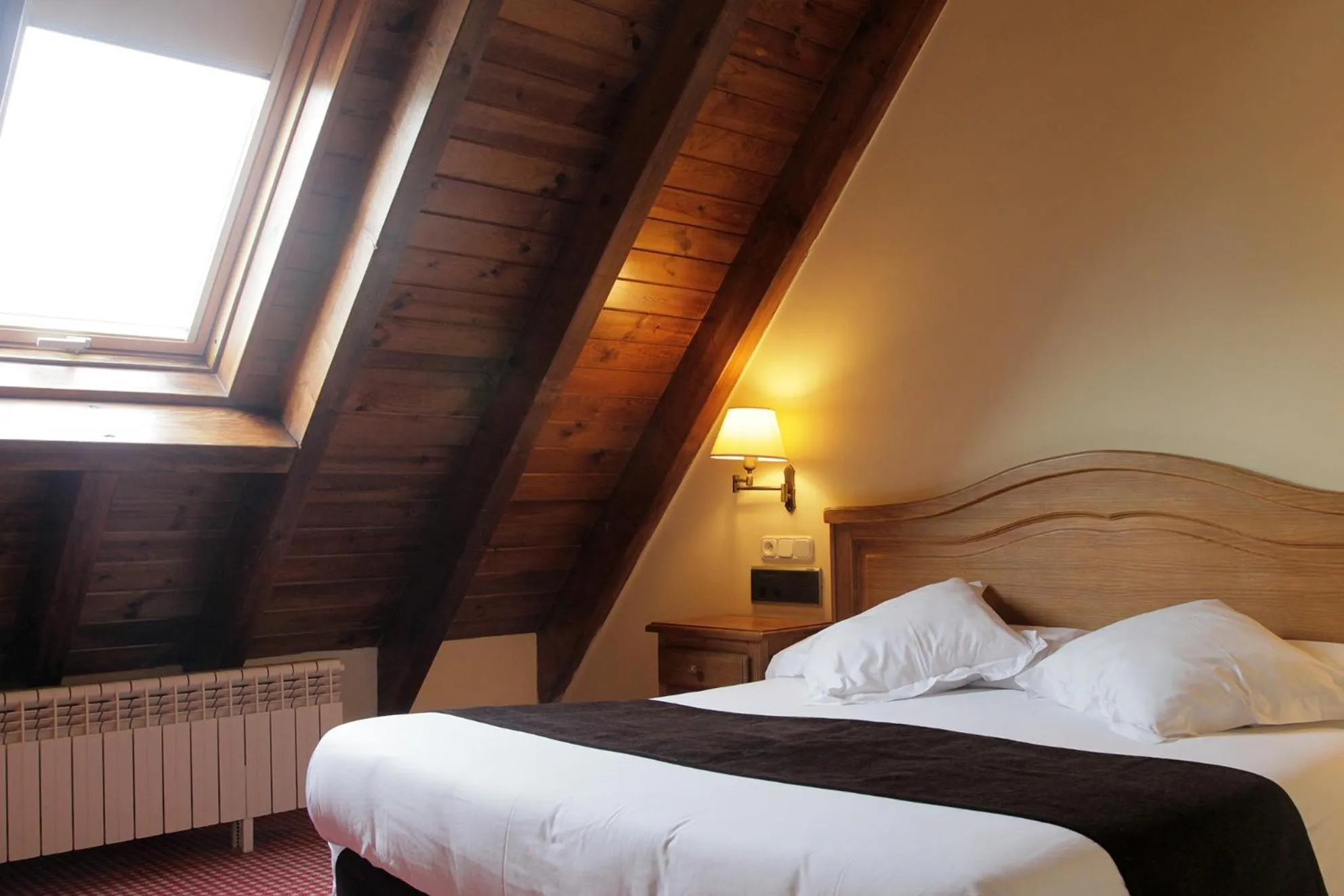 Bed in Hotel Chalet Bassibe