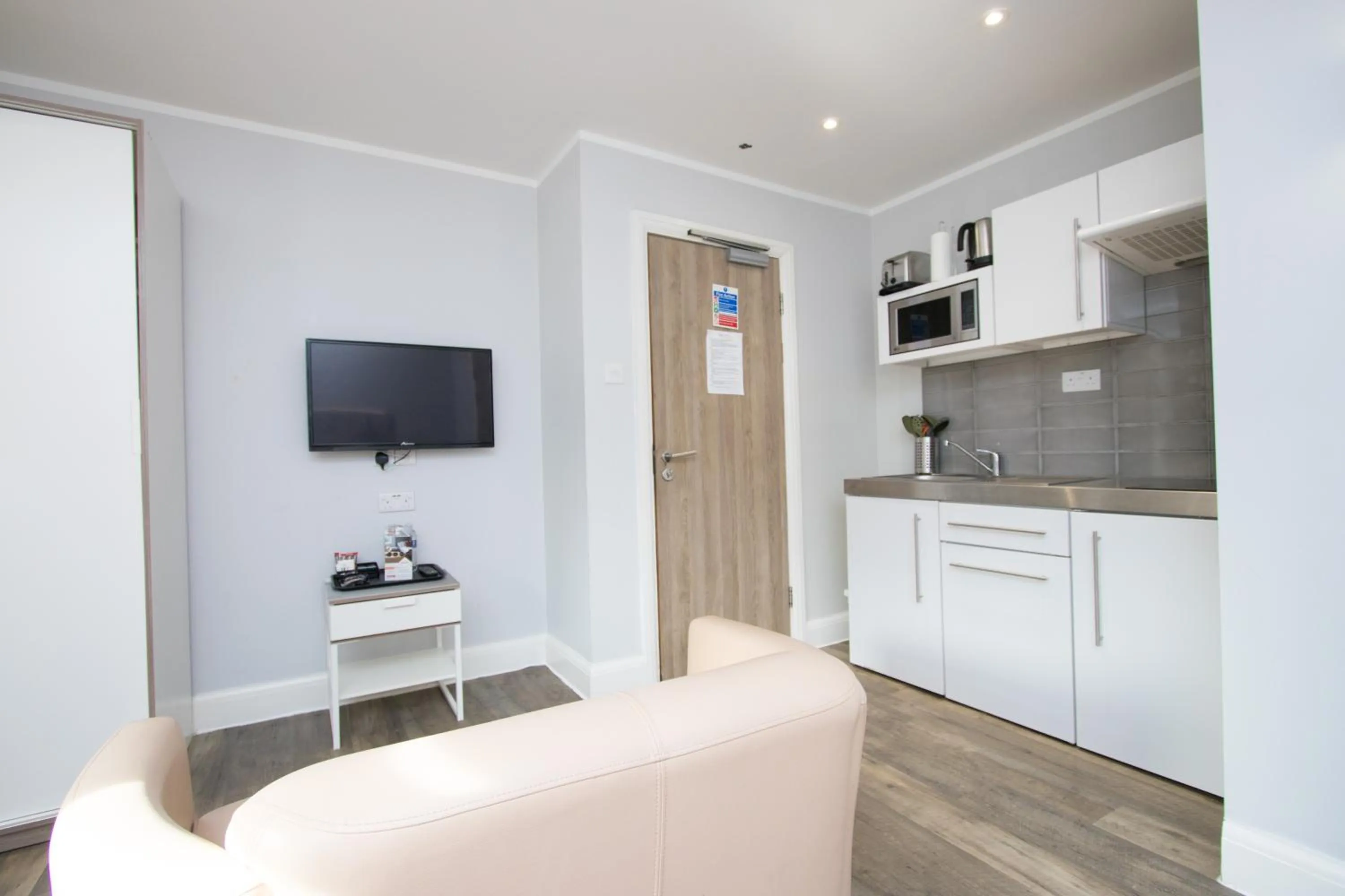 Kitchen or kitchenette in Westciti Caroco Aparthotel