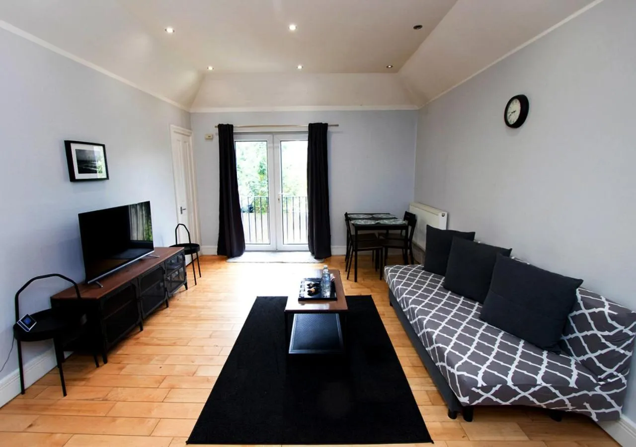 Communal lounge/ TV room in Westciti Caroco Aparthotel