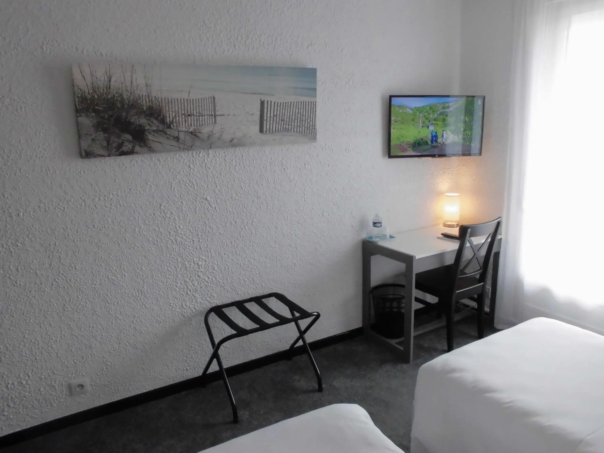 Decorative detail, Bed in Cit'Hotel Le Challans