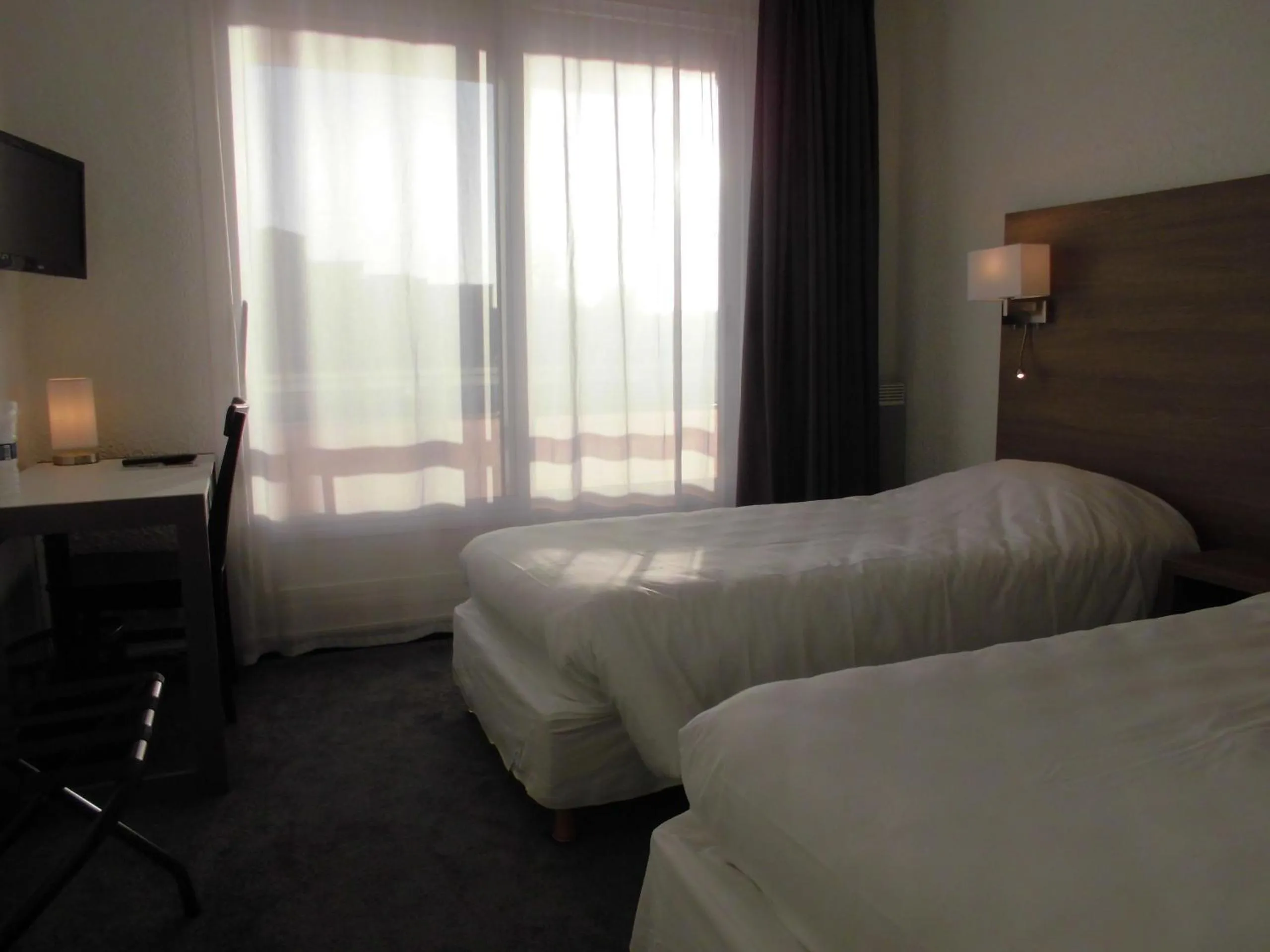 Bed in Cit'Hotel Le Challans