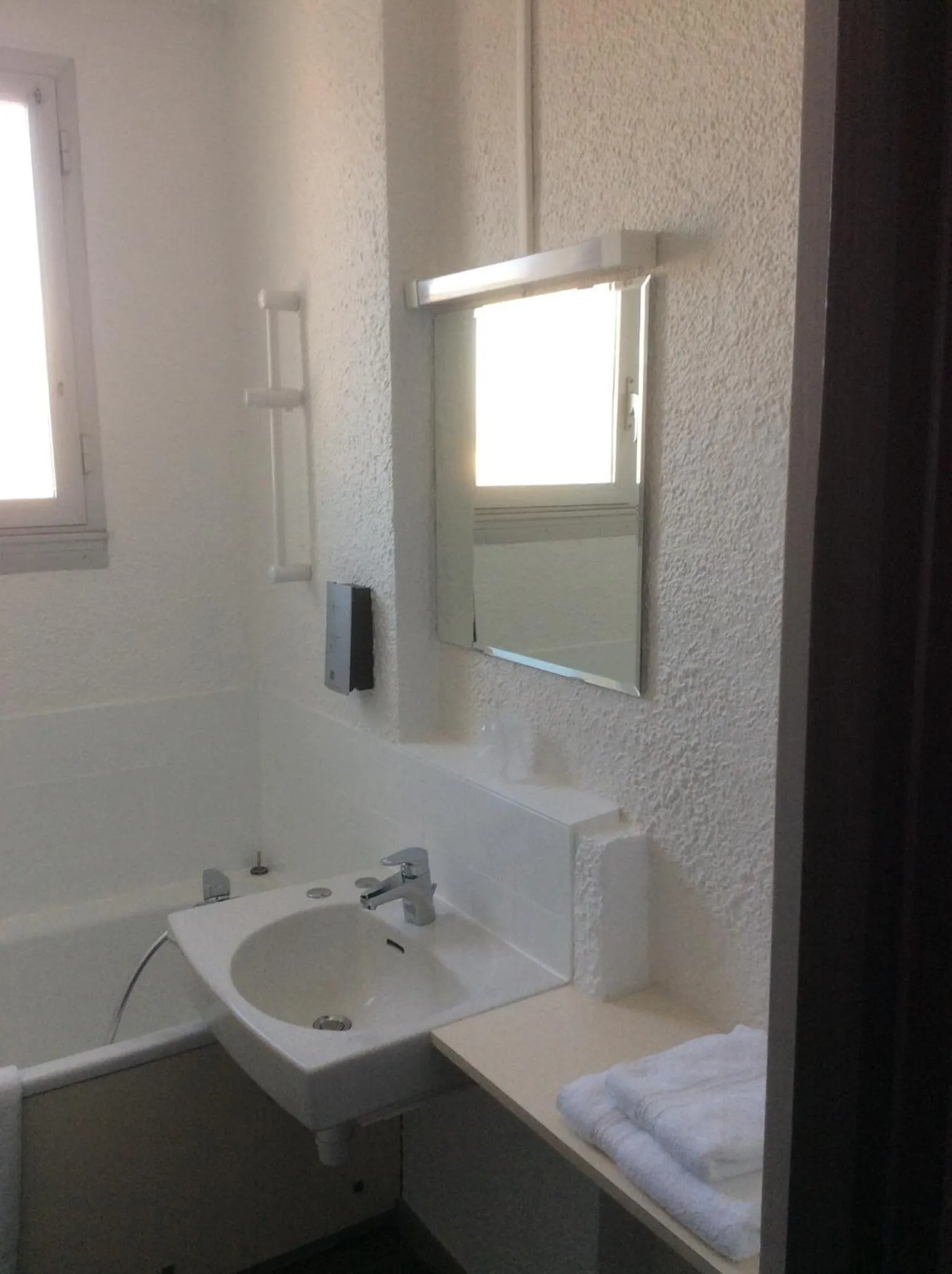 Bathroom in Cit'Hotel Le Challans