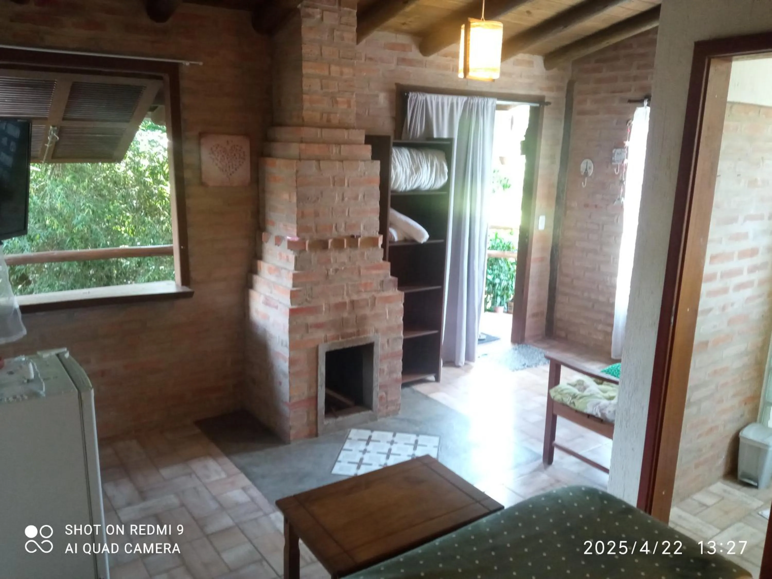 Living room in Pousada Refúgio dos Pássaros