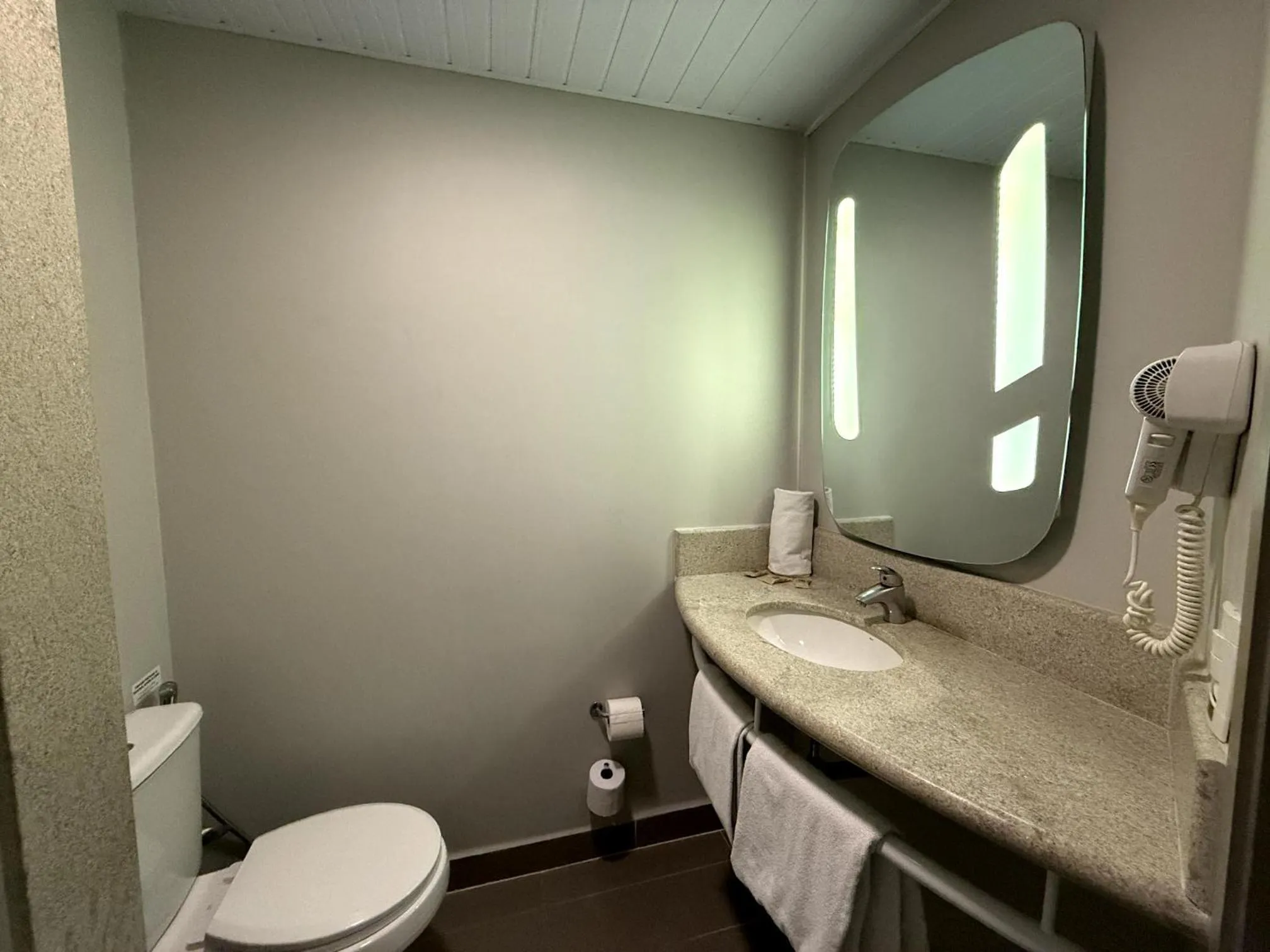 Toilet in ibis Sao Paulo Ibirapuera