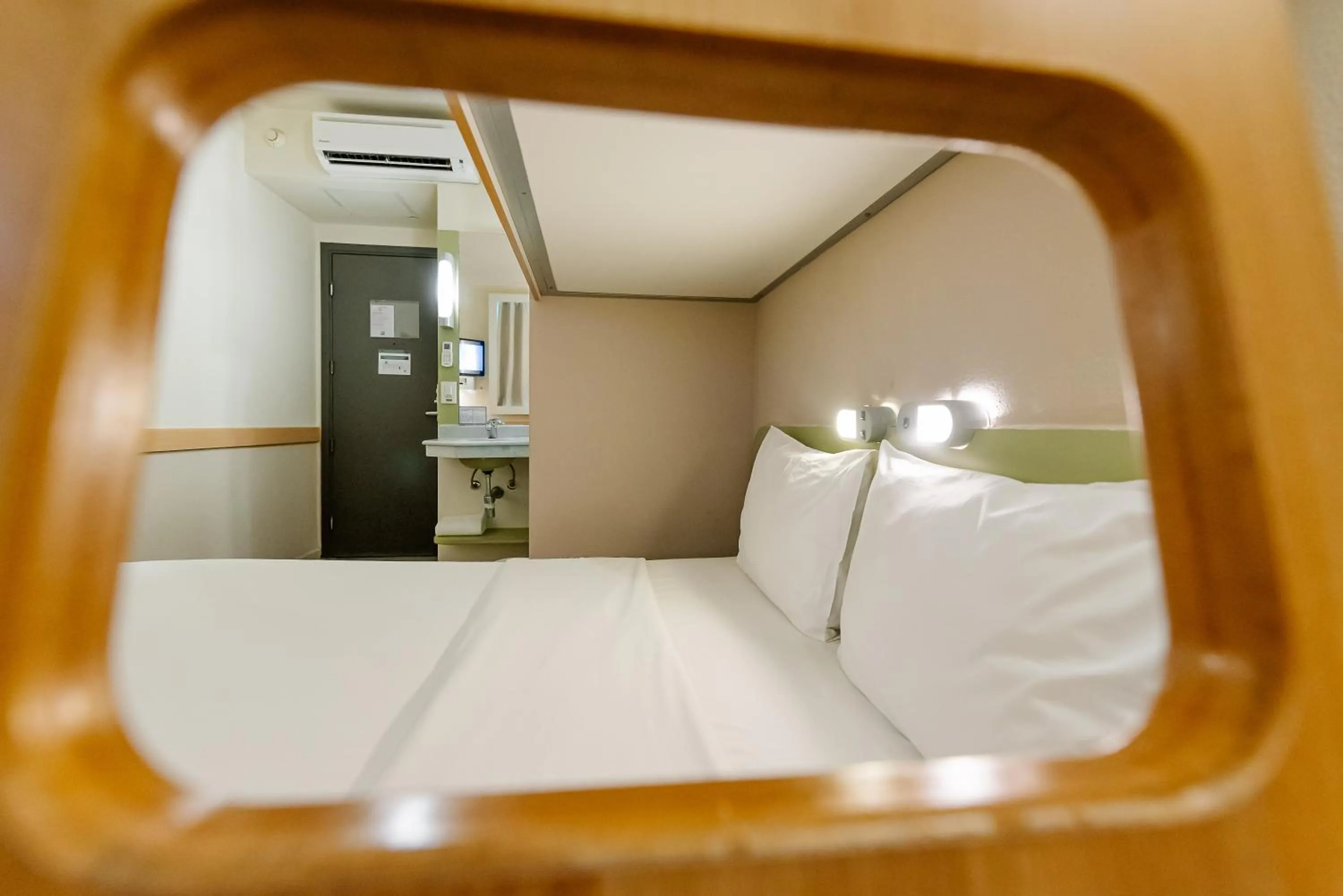 Bedroom in ibis budget Vitoria