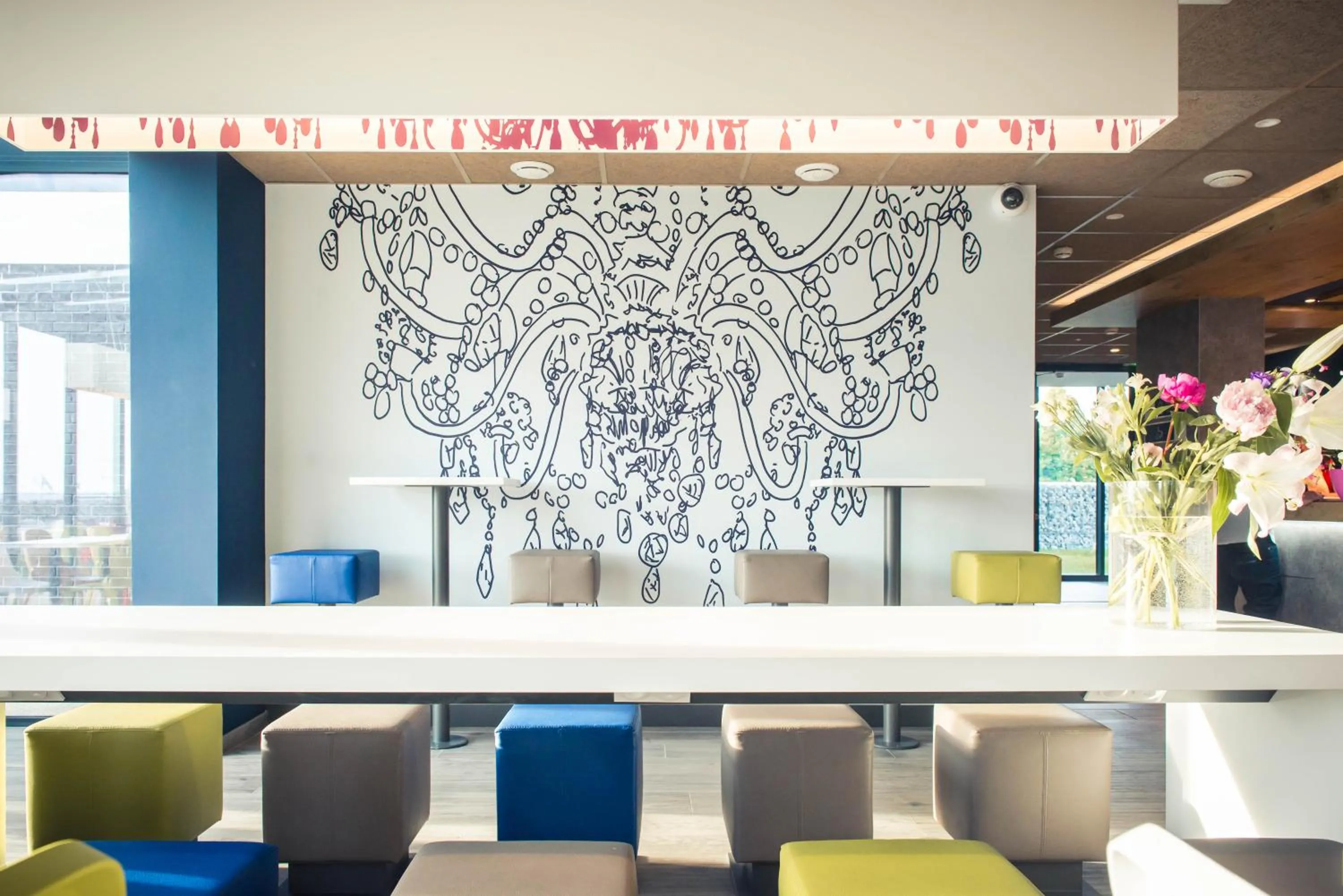 Lobby or reception in ibis budget Troyes Est