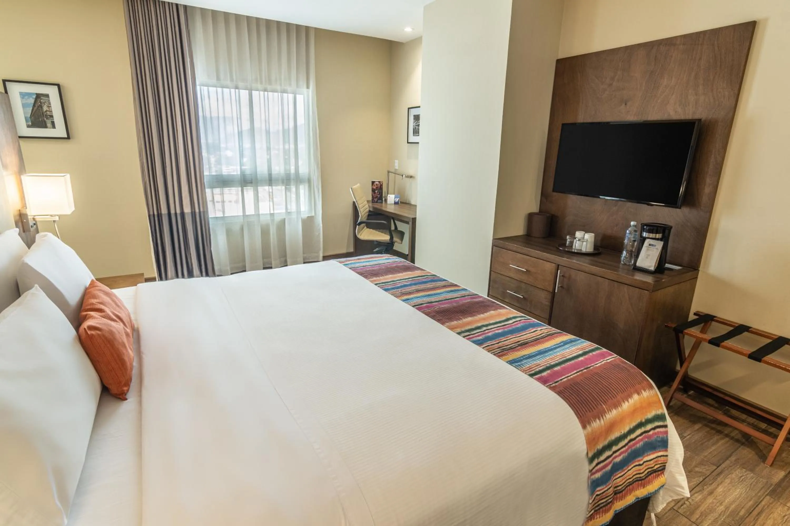 Photo of the whole room, Bed in LATAM HOTEL Plaza Pradera Quetzaltenango