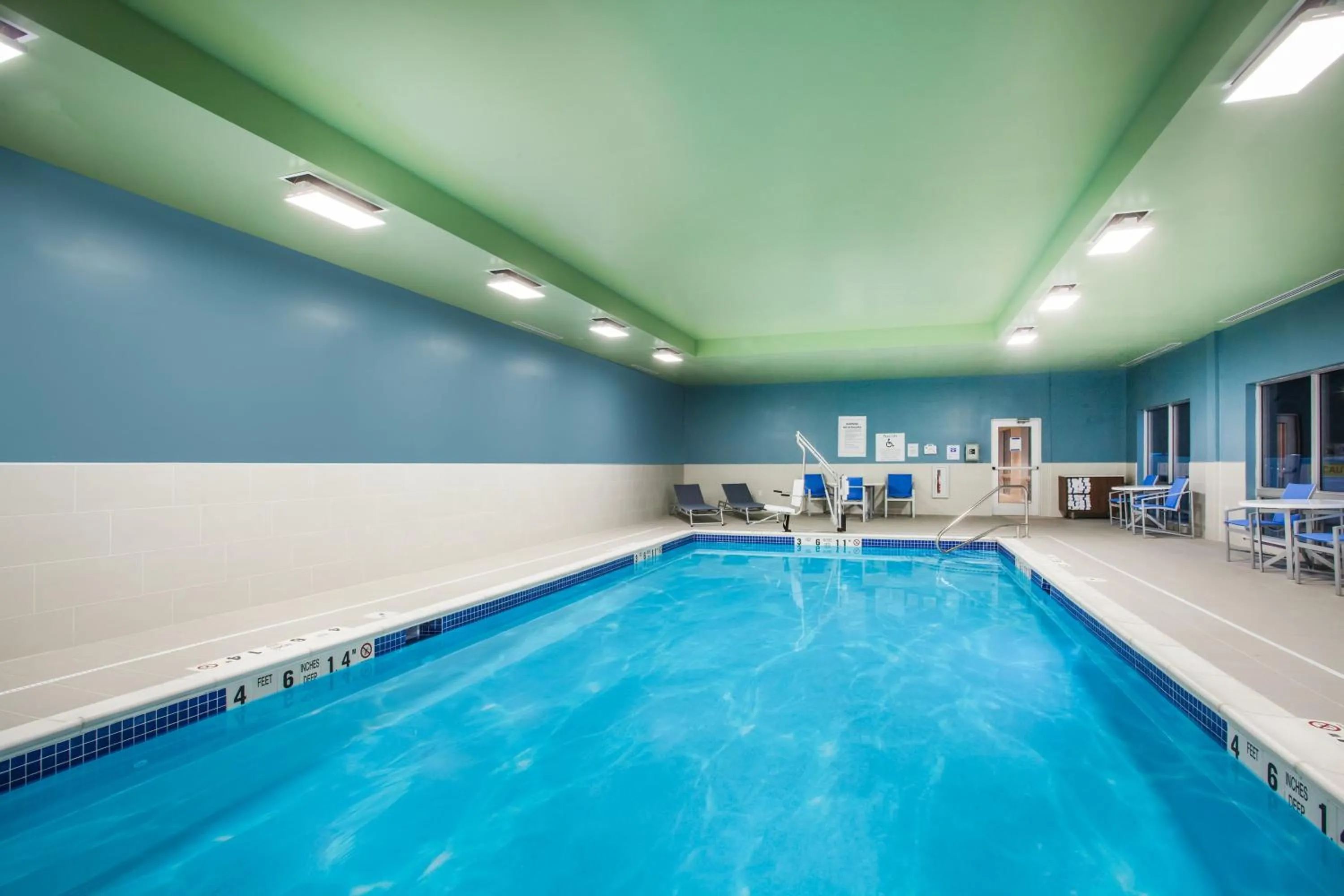 Swimming pool in Holiday Inn Express Queensbury-Lake George Area by IHG