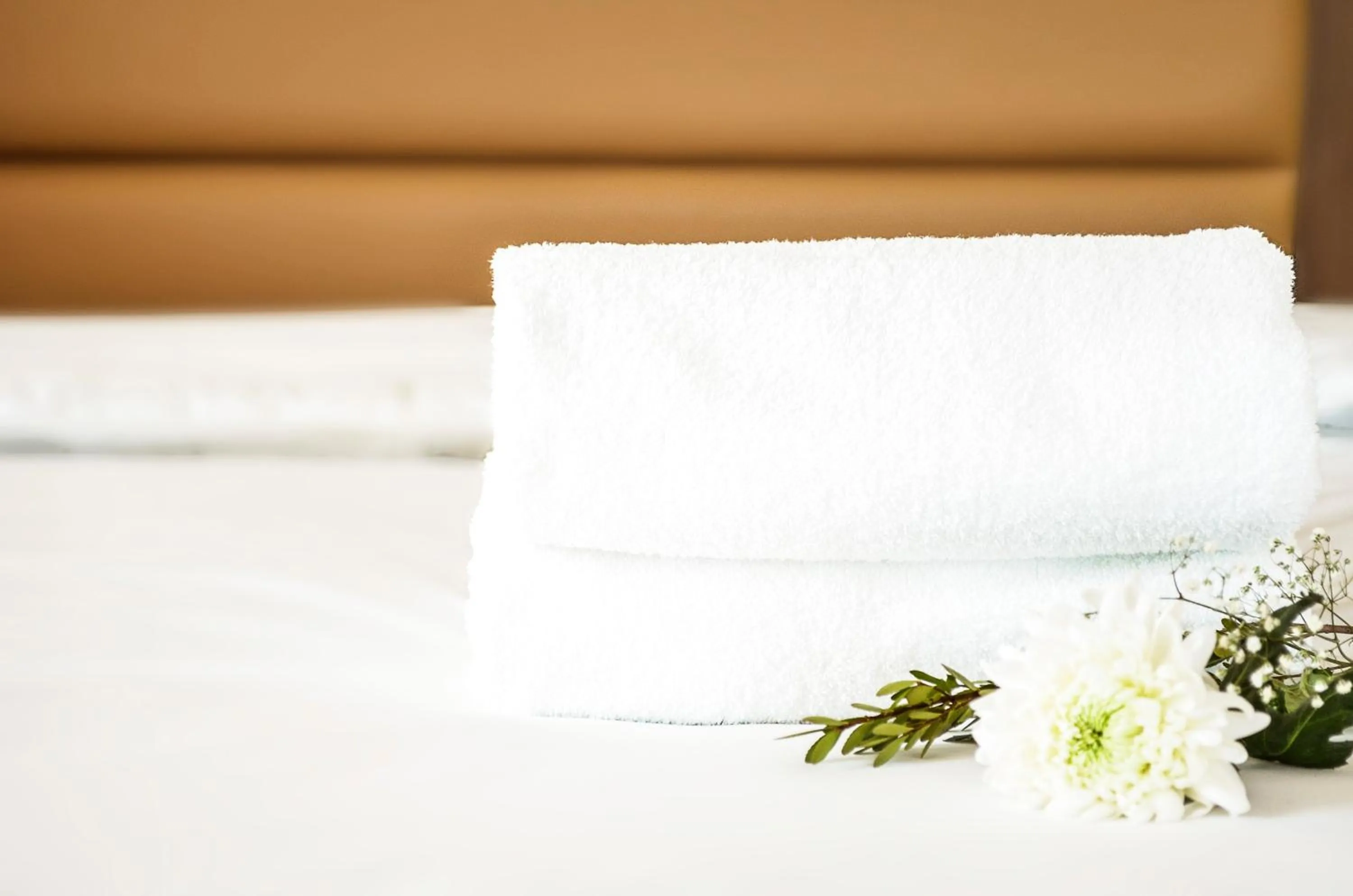 towels, Bed in MStar Hotel